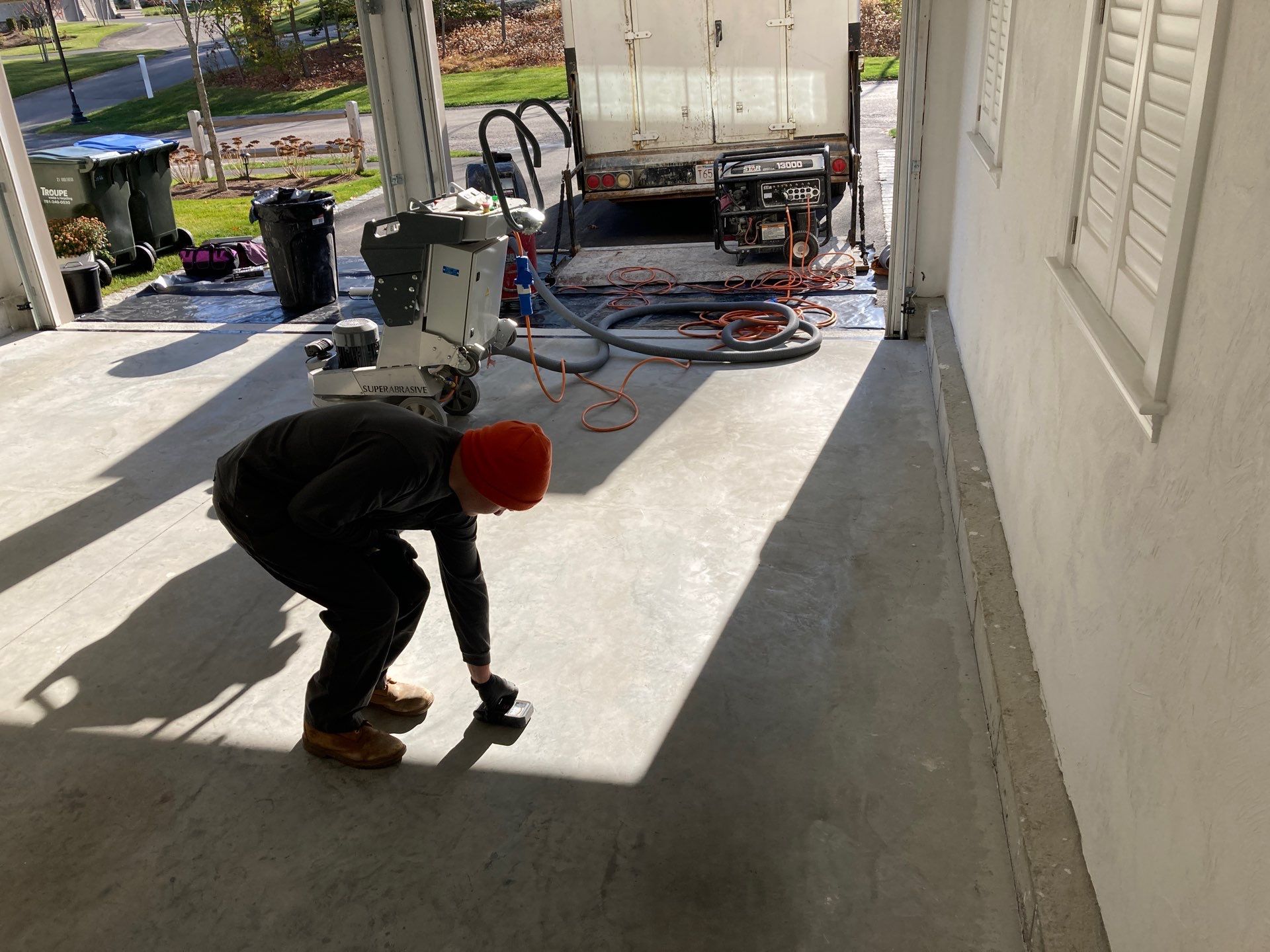 Cuddy Garage TransFLOORmation by Symphony Concrete Coatings