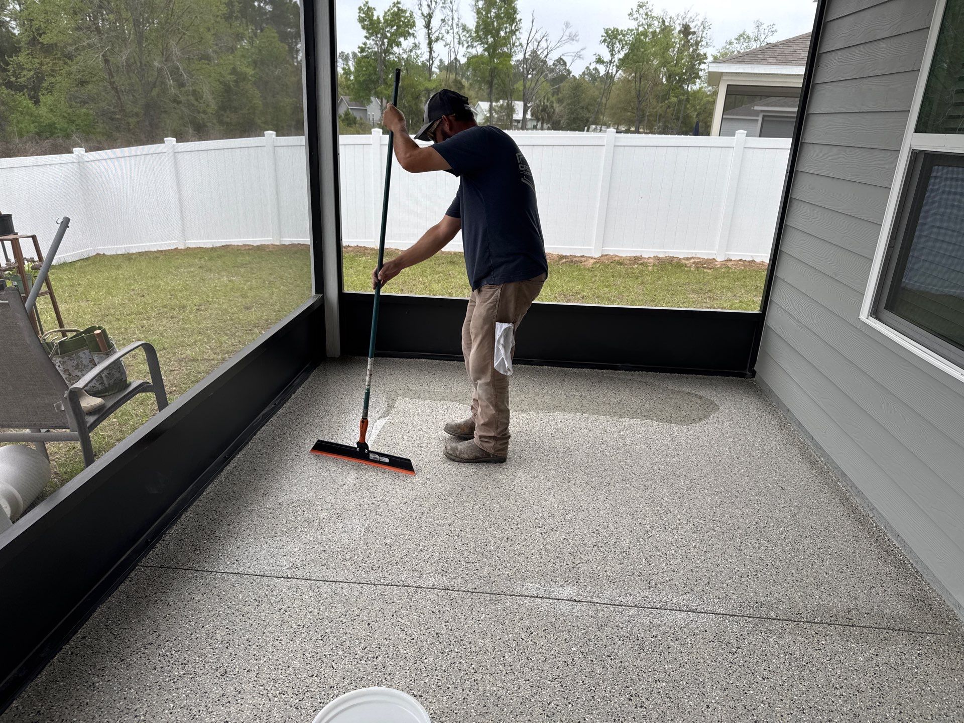 Back Porch in Mediterranean  by Cross Creek Concrete Coatings