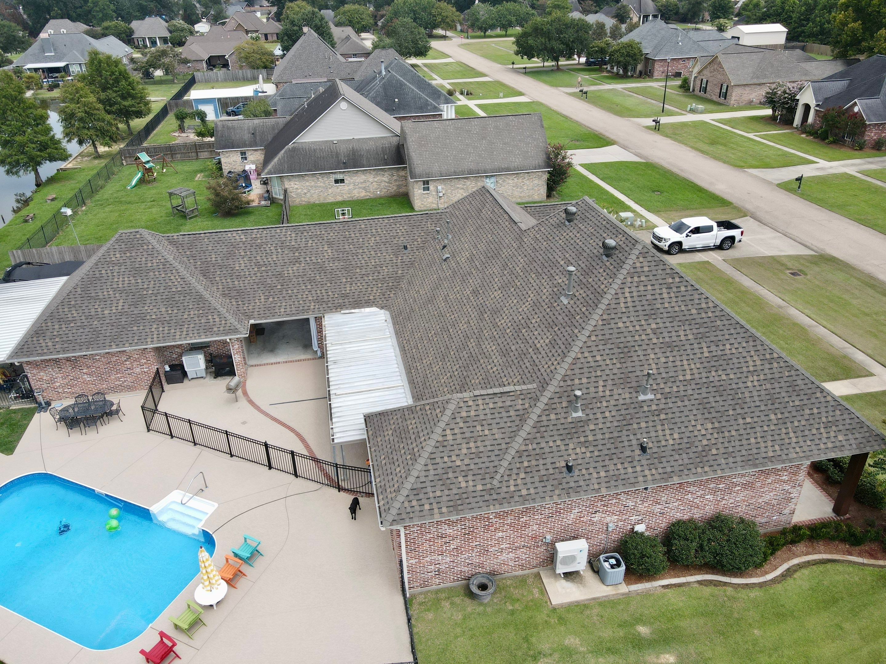 Residential Roofing Installation using Atlas Pinnacle Pristine Weathered Shadow and Atlas High Profile Ridge Cap by Top Team Construction