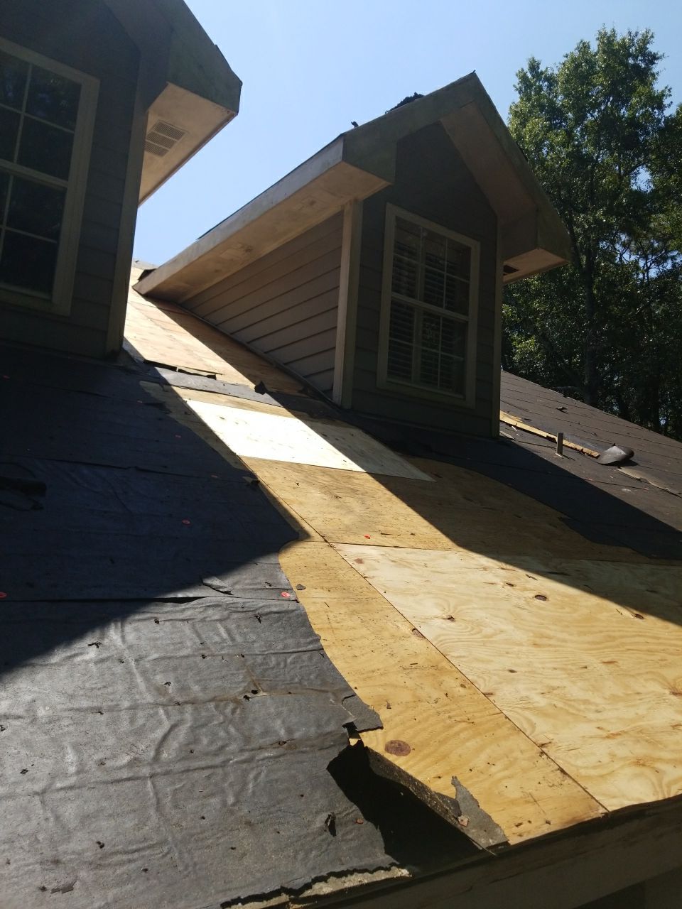 Residential Roofing Installation using Roof Replacement by American Roofing & Construction LLC