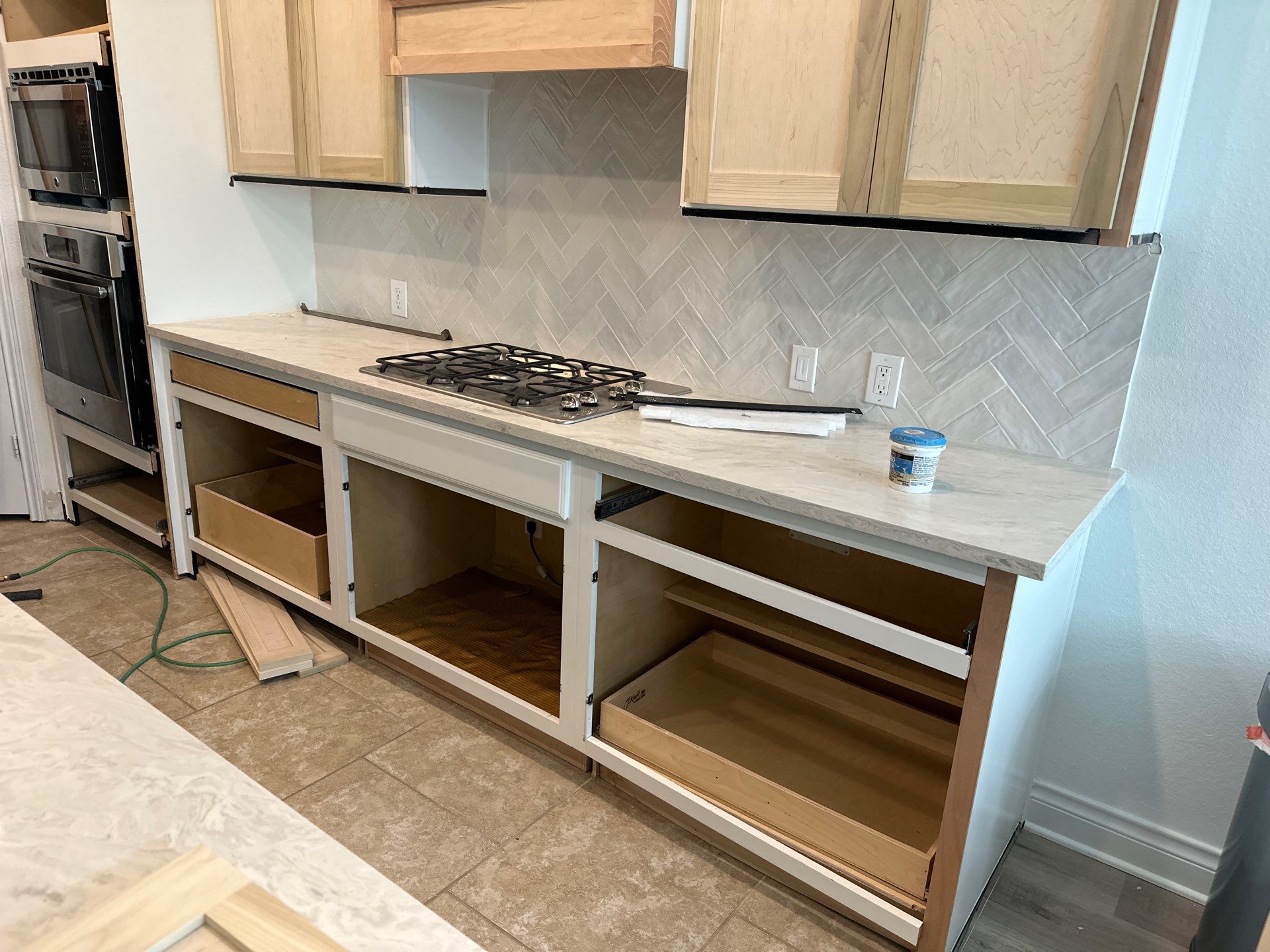 Kitchen Remodel using Water mitigation equipment by L&T General Contractors and Restoration INC