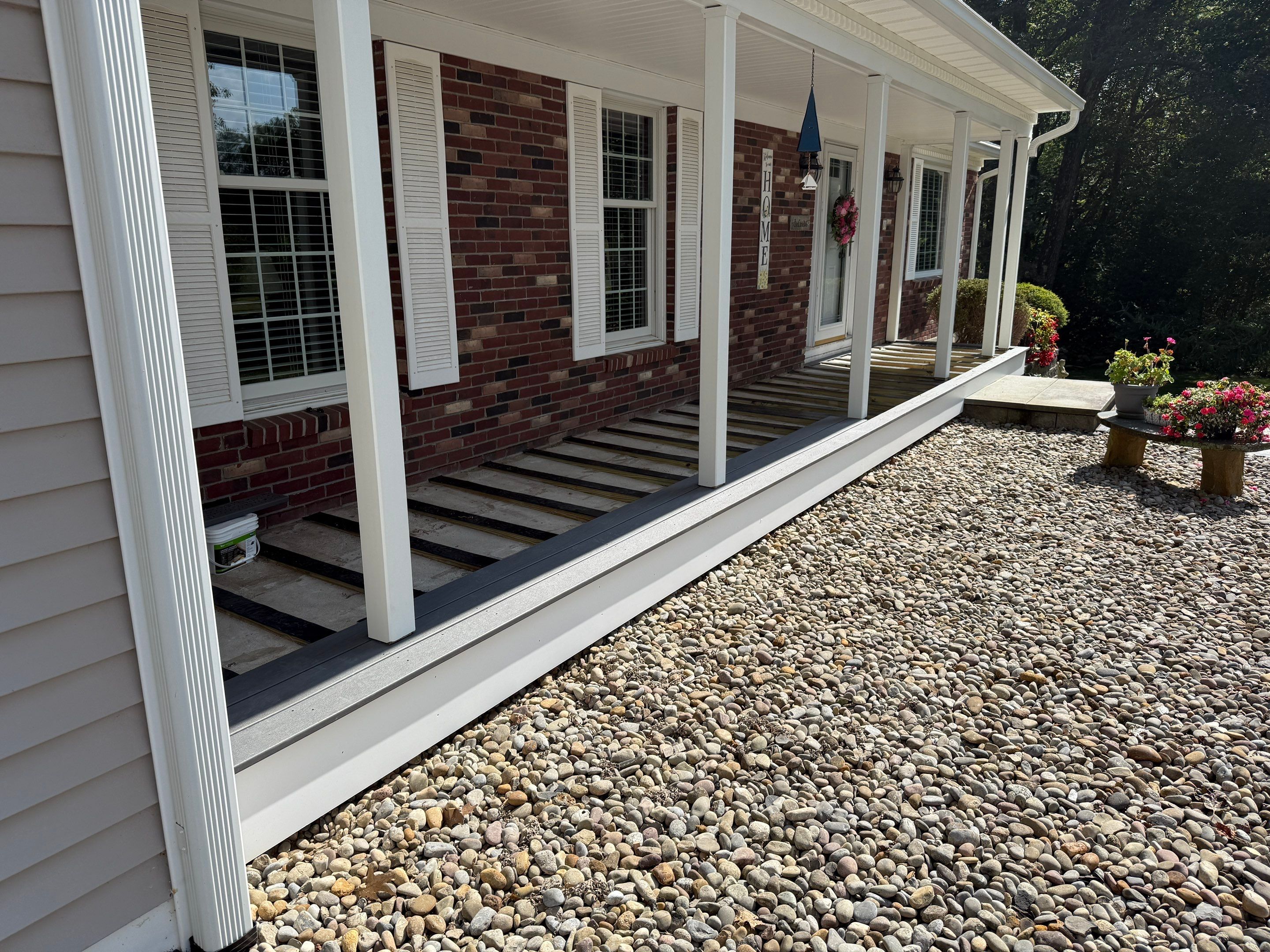 Replacement of front and back decks using Trex Lineage Island mist and Trex Lineage Rainier by DiGiorgi Roofing and Siding Inc