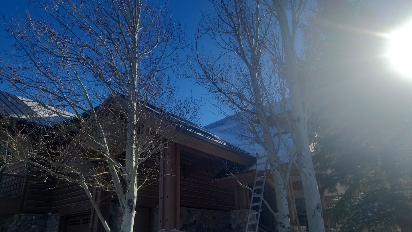 Standing Seam Metal Roof Replacement After Snow Damage by ASAP Roofing & Restoration