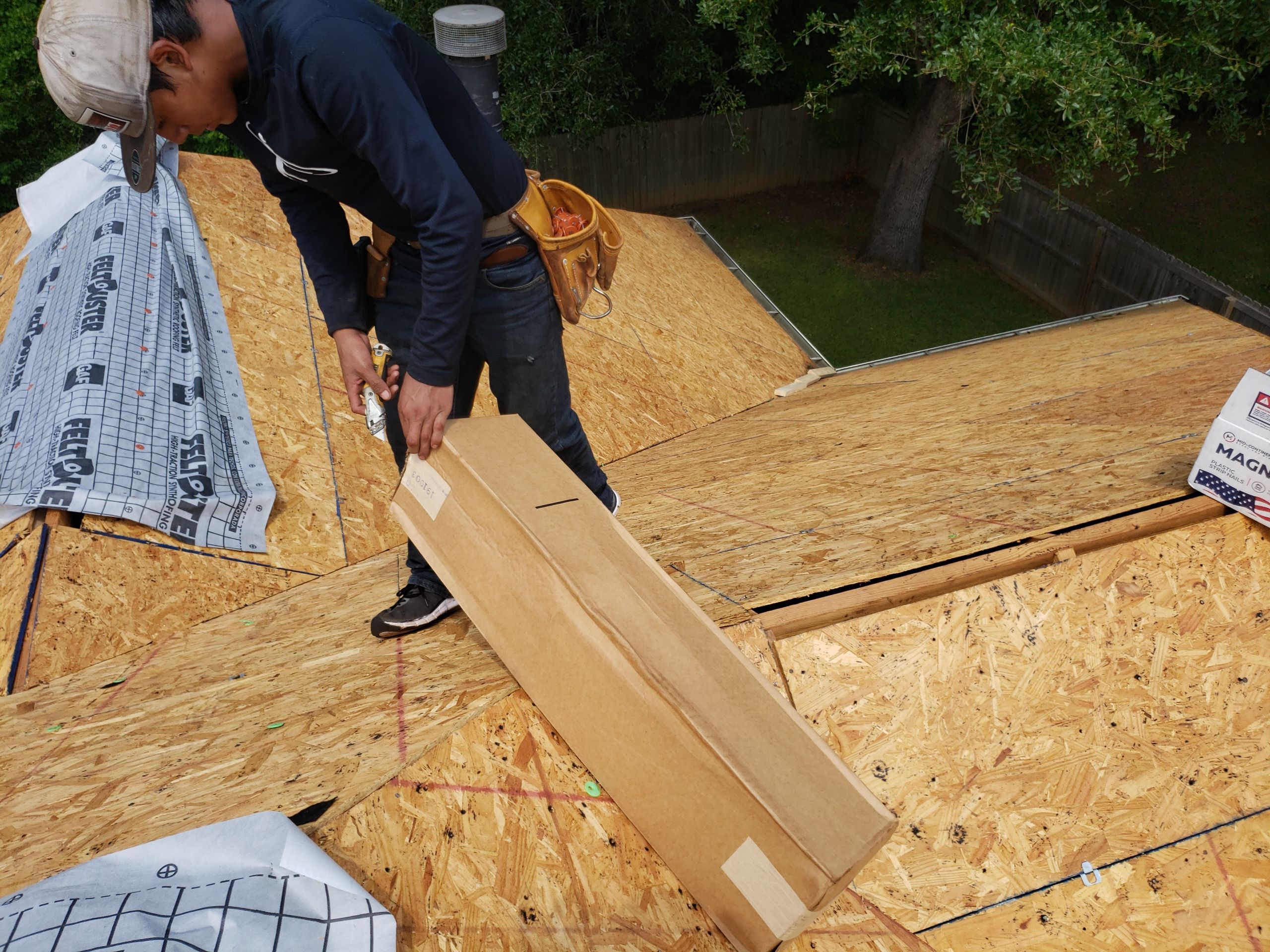 Residential Roofing Installation using Roof Replacement by American Roofing & Construction LLC