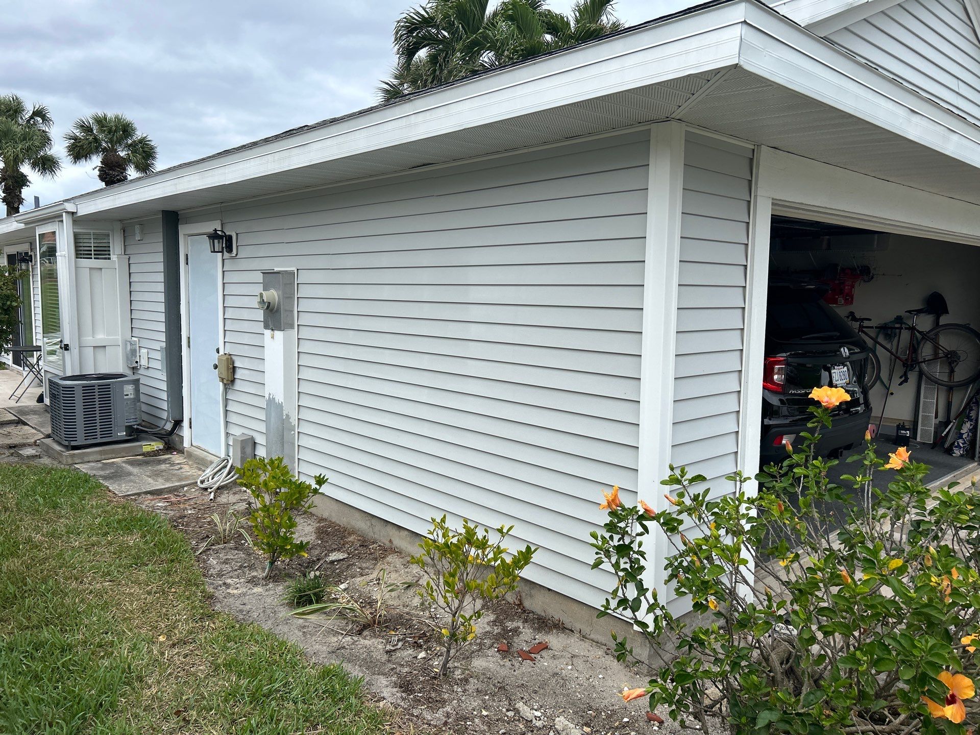 White Seamless Gutters in Fort Myers FL by Gutter Professors