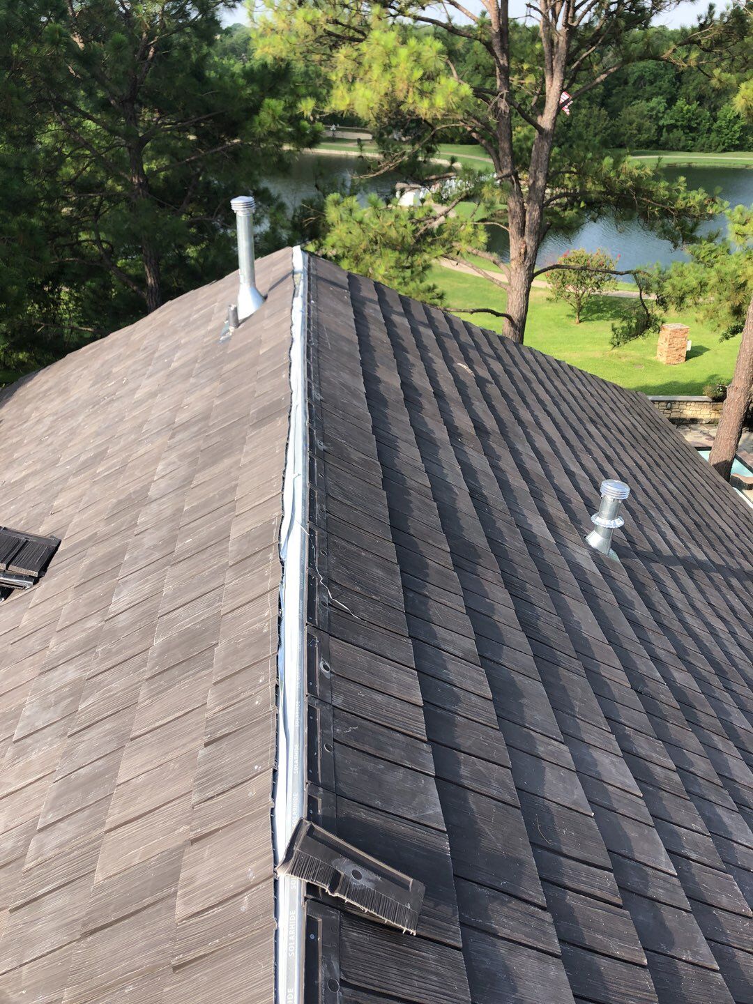 Designer Residential Roof with Zip System by Springtree Restoration