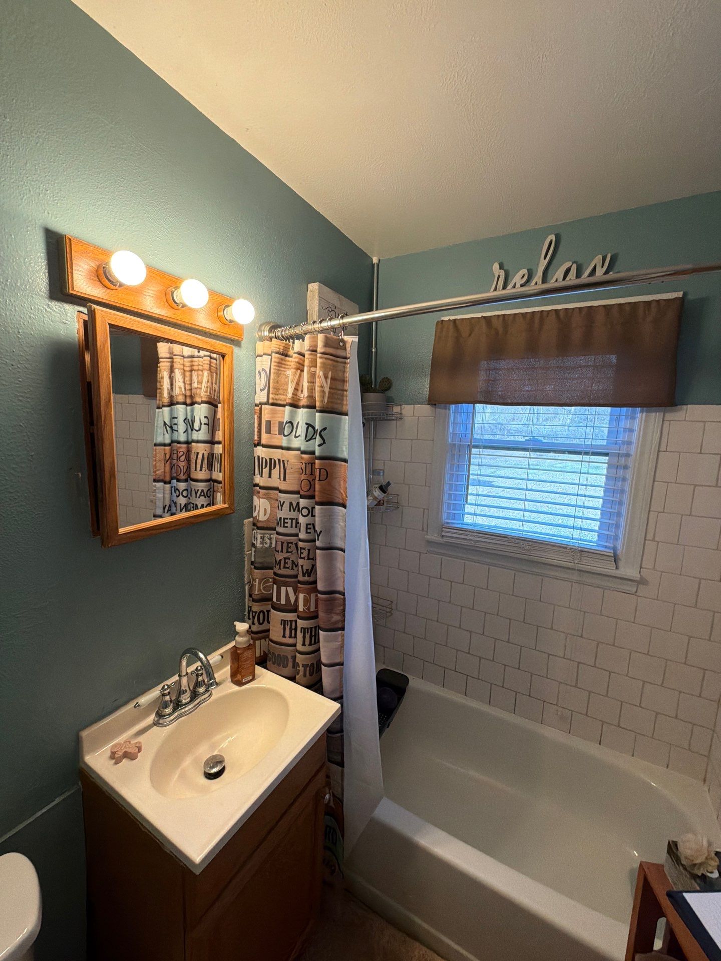 Beautiful Bathroom Remodel by In & Out Construction & Remodeling, LLC