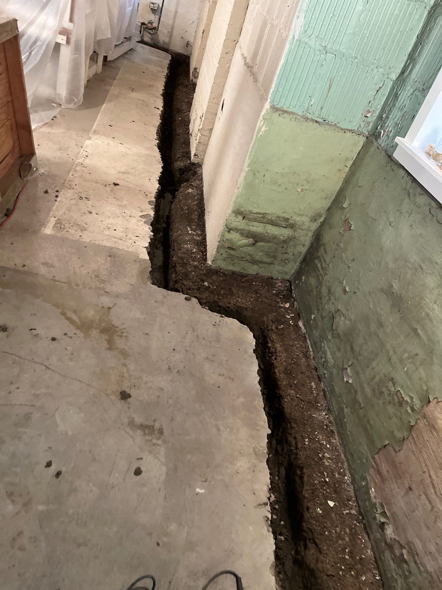 Berwyn- Interior Drain Tile System by Area Wide Waterproofing