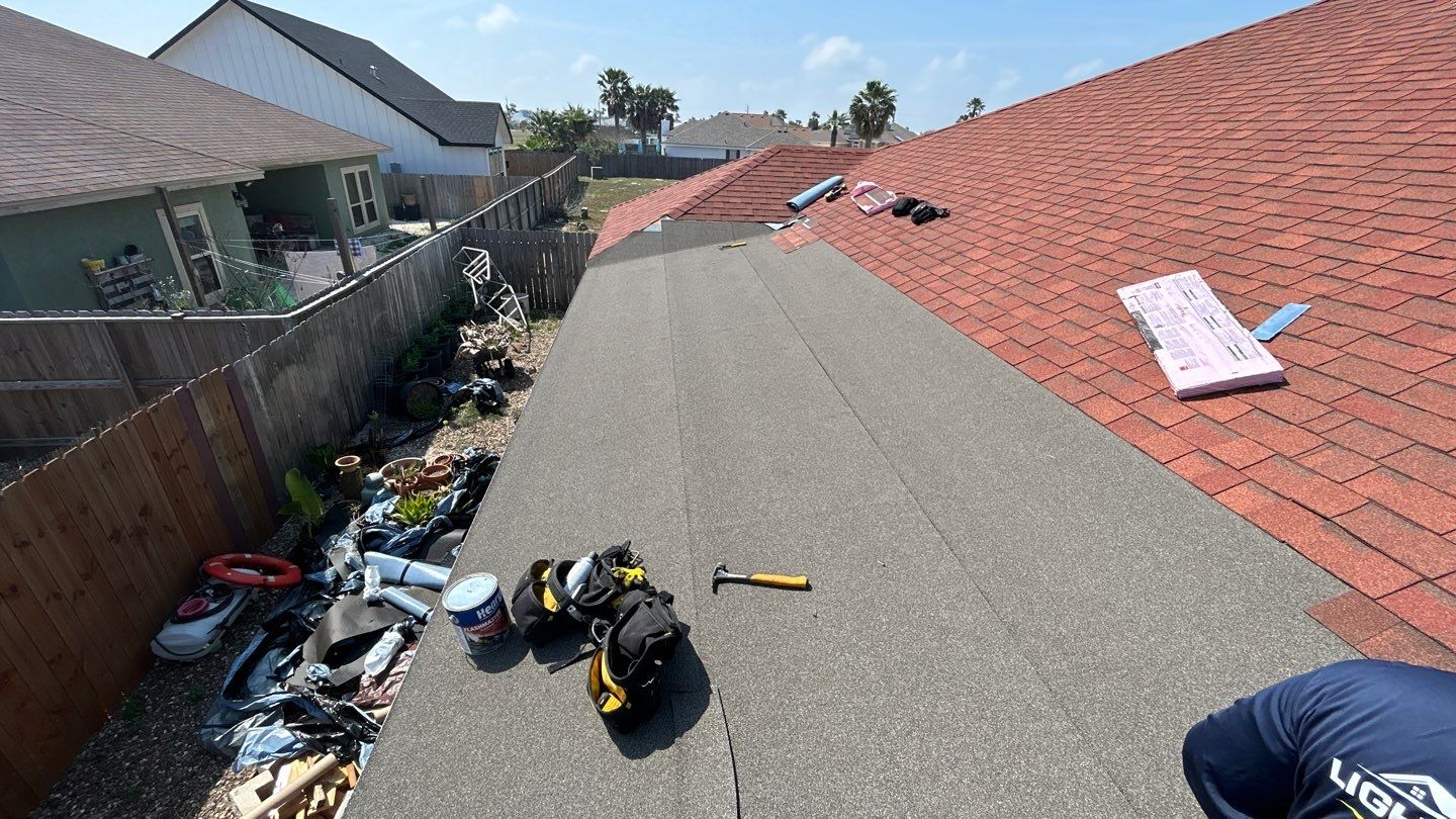 Residential Roofing Installation using Flat Roof System by Lighthouse Roofing