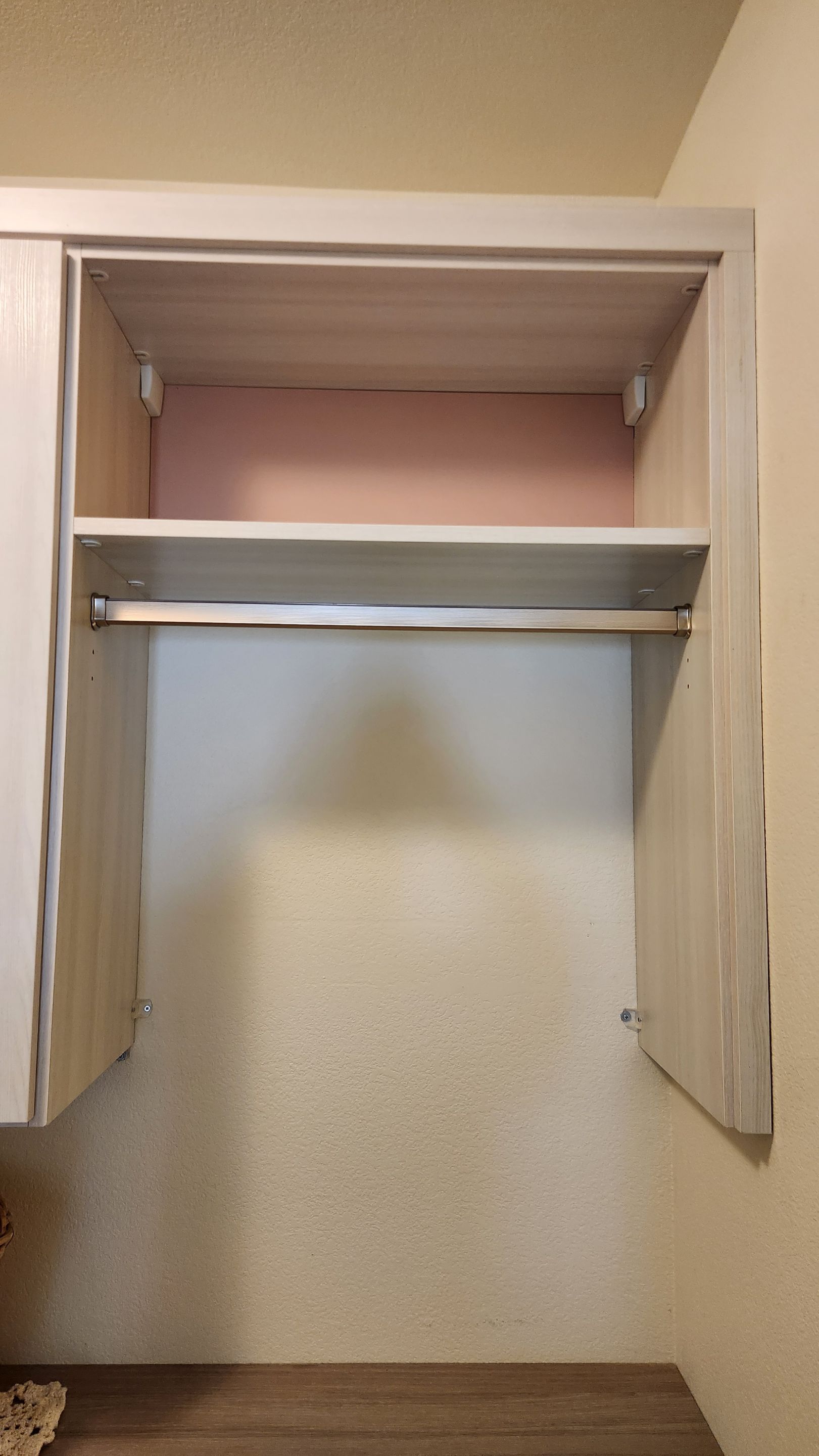 Laundry Room designed to match closets by Concept 32, Inc.