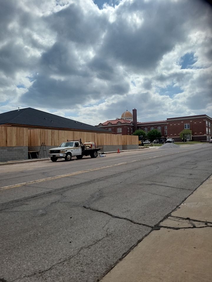Cedar Fence using Cedar Pickets and Metal Poles by Clays Services Inc