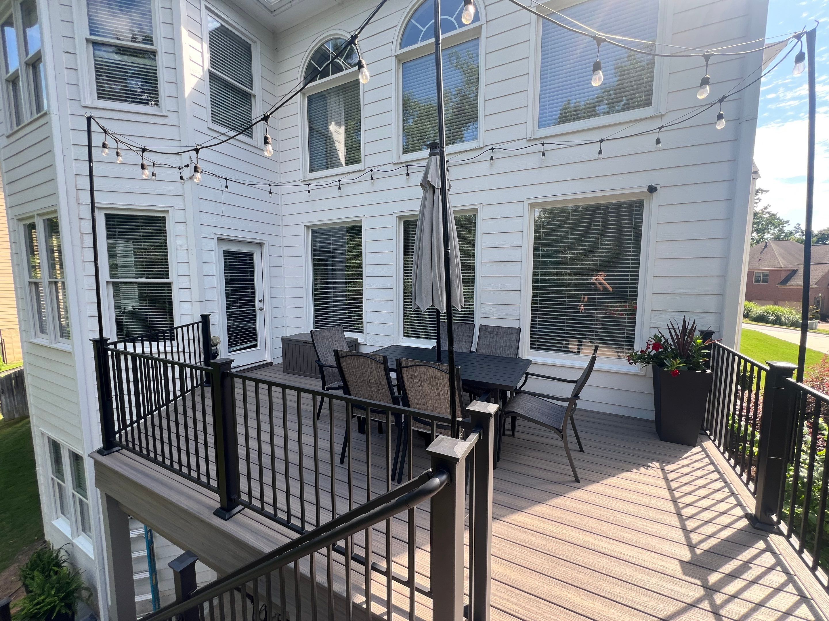 Elevated Composite Deck and Concrete Landing Installation in Kennesaw by Swift Home Renovations