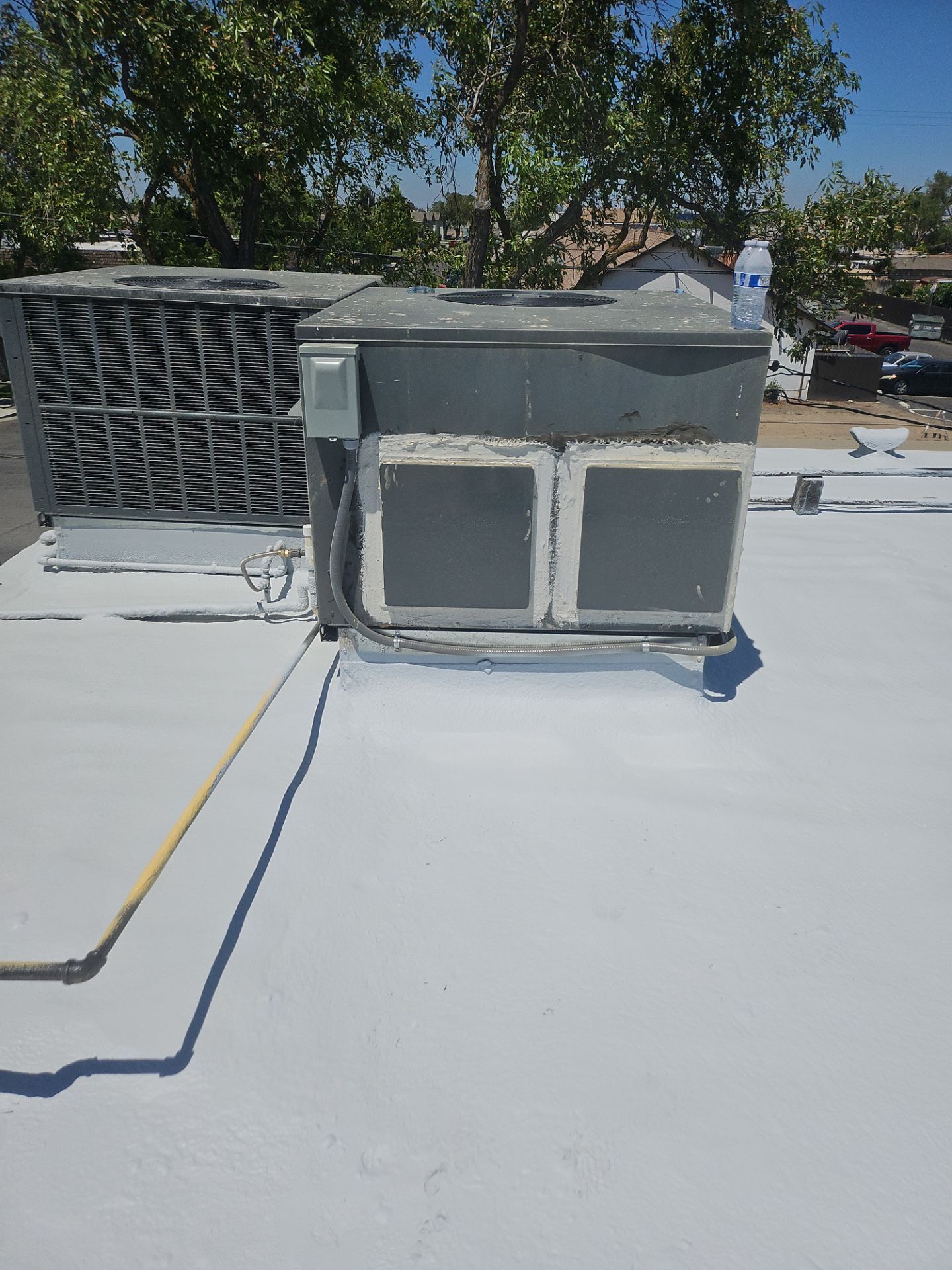 Foam Refurbish using General Coatings acrylic coatings and spray foam by Straight Edge Roofing Inc