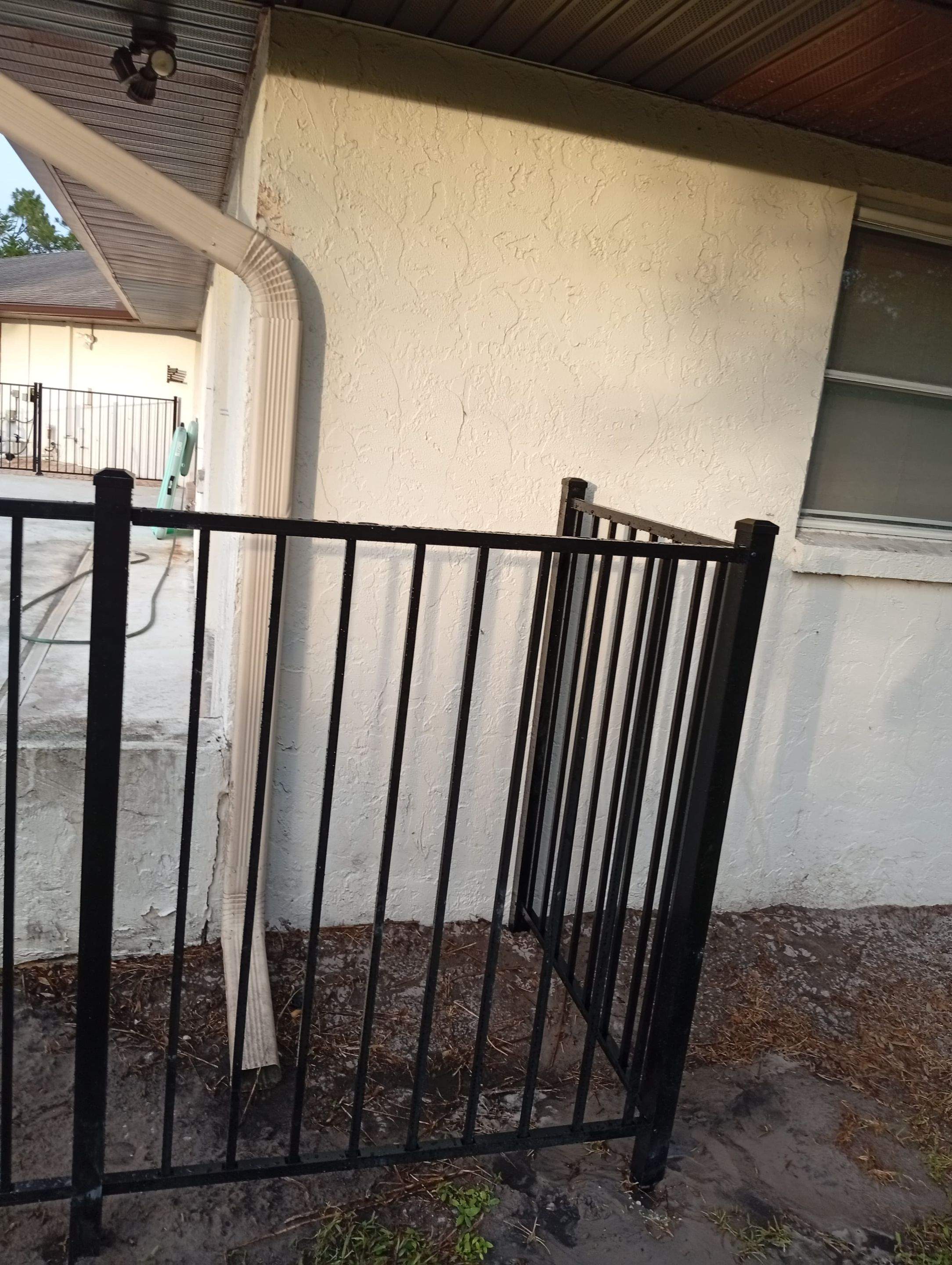Black Aluminum Pool Safety Fence Installation in Punta Gorda by True Fence LLC
