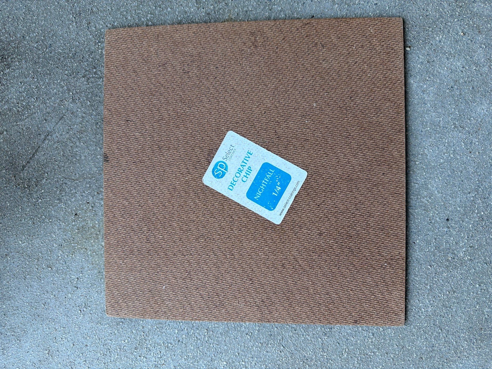 Sioux Falls Garage Floor Coating with Nightfall Decorative Chips by Select Painting, Coatings & Garage Cabinets