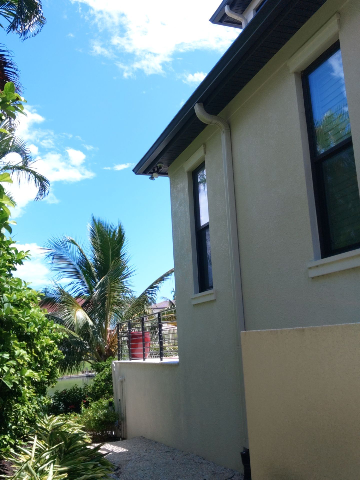 Bronze Gutters and Almond Downspouts in Longboat Key FL by Gutter Professors