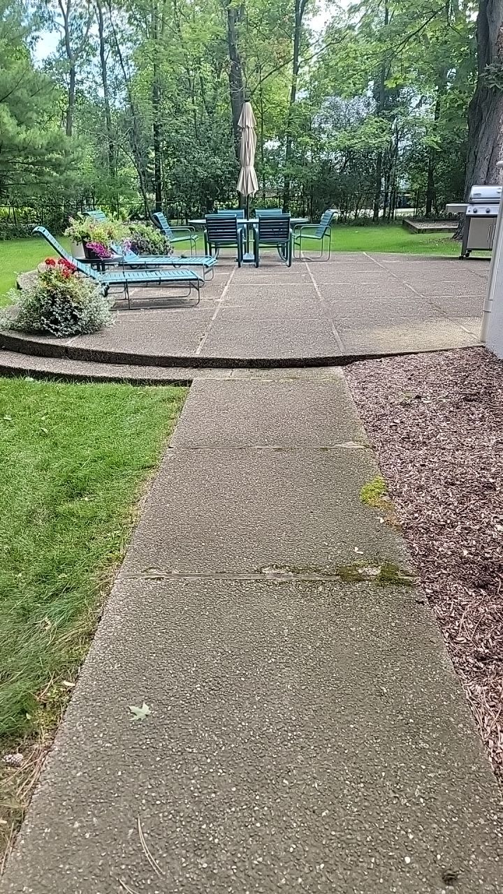 Housewashing  using Algaecide, soft wash soap by Northern Power Washing LLC.