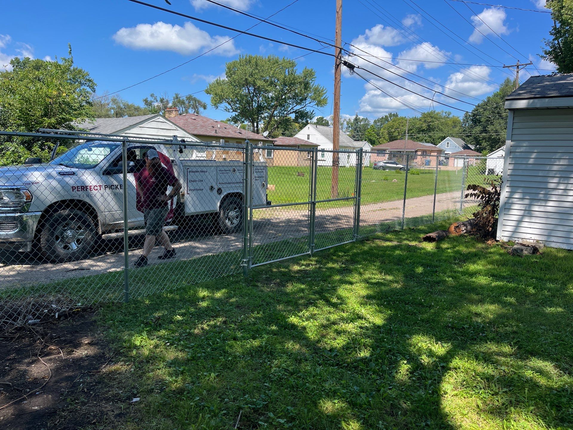 Galvanized Chain Link Fence Installation and Site Clearing in Waterloo by Perfect Picket Fence and Stain