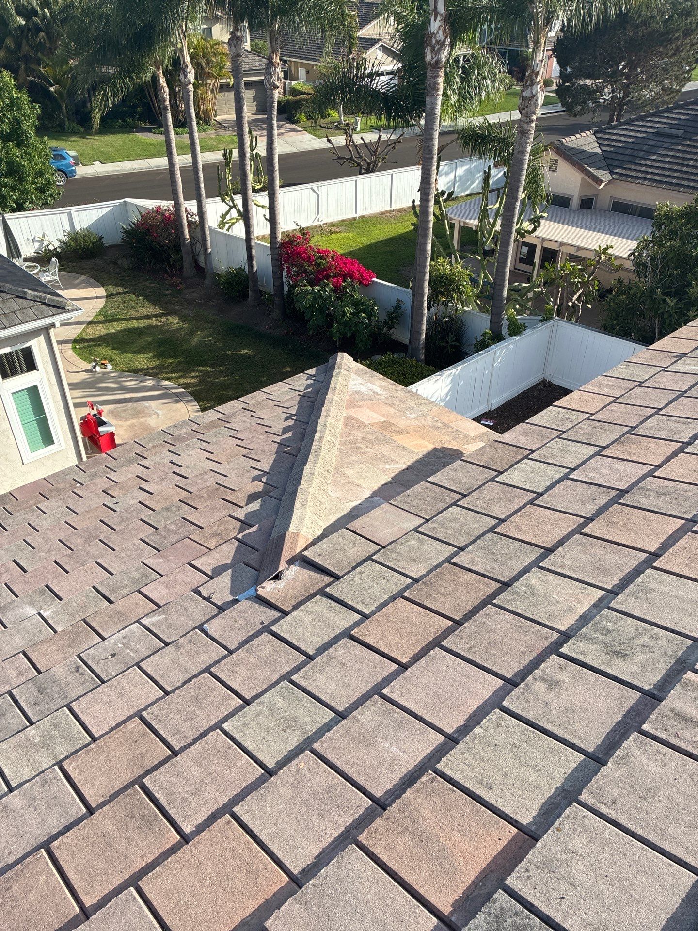 Carlsbad Concrete Tile Roof Replacement with Copper Flashing and Skylights by Reliable Roofing San Diego Inc.