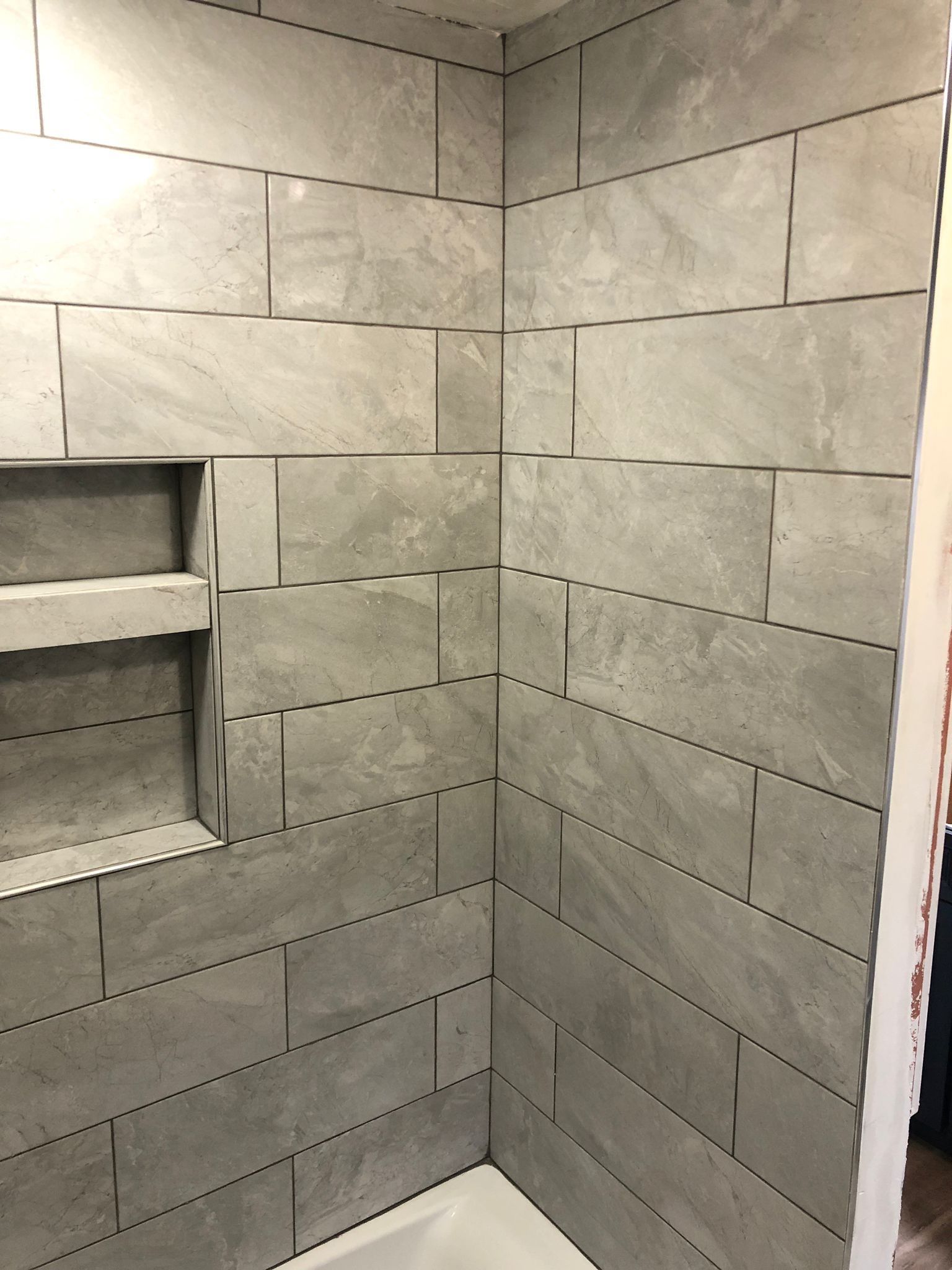 Bathroom Remodel using Tile by Home Concepts Construction