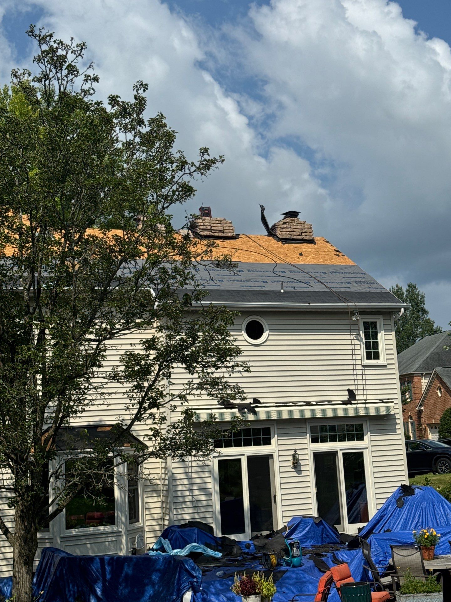 New Shingle Roof & New Gutters and downspouts with covers by Alpha Design Services