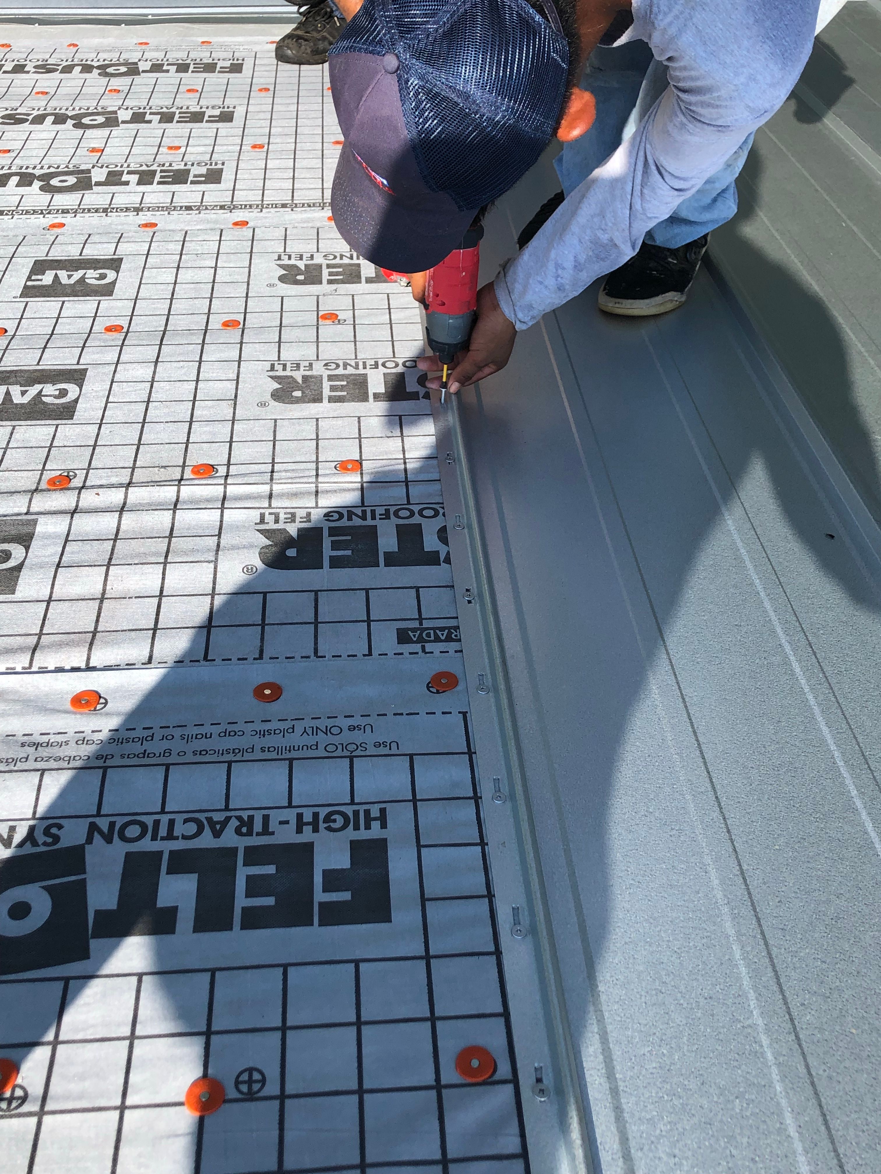 Residential Roofing Installation using Metal roofing by American Roofing & Construction LLC
