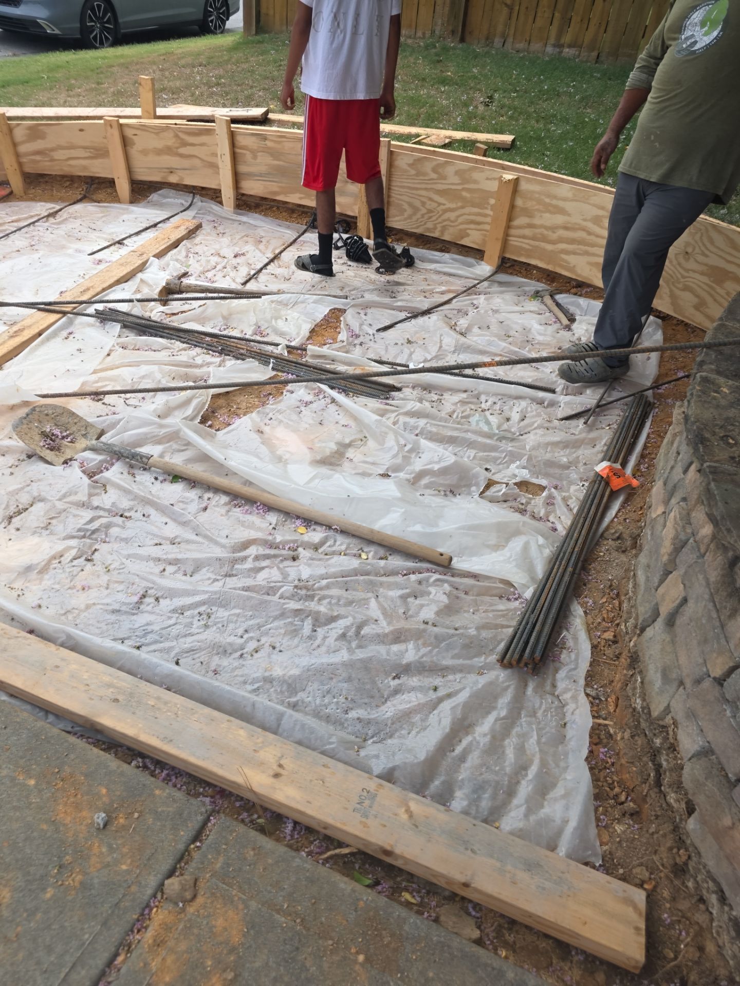 Concrete Driveway Expansion & Retaining Wall | Apex, NC by Elite Remodeling and Design LLC
