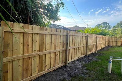 Wood Fence Installation using Wood Pressure Treated Fence 
