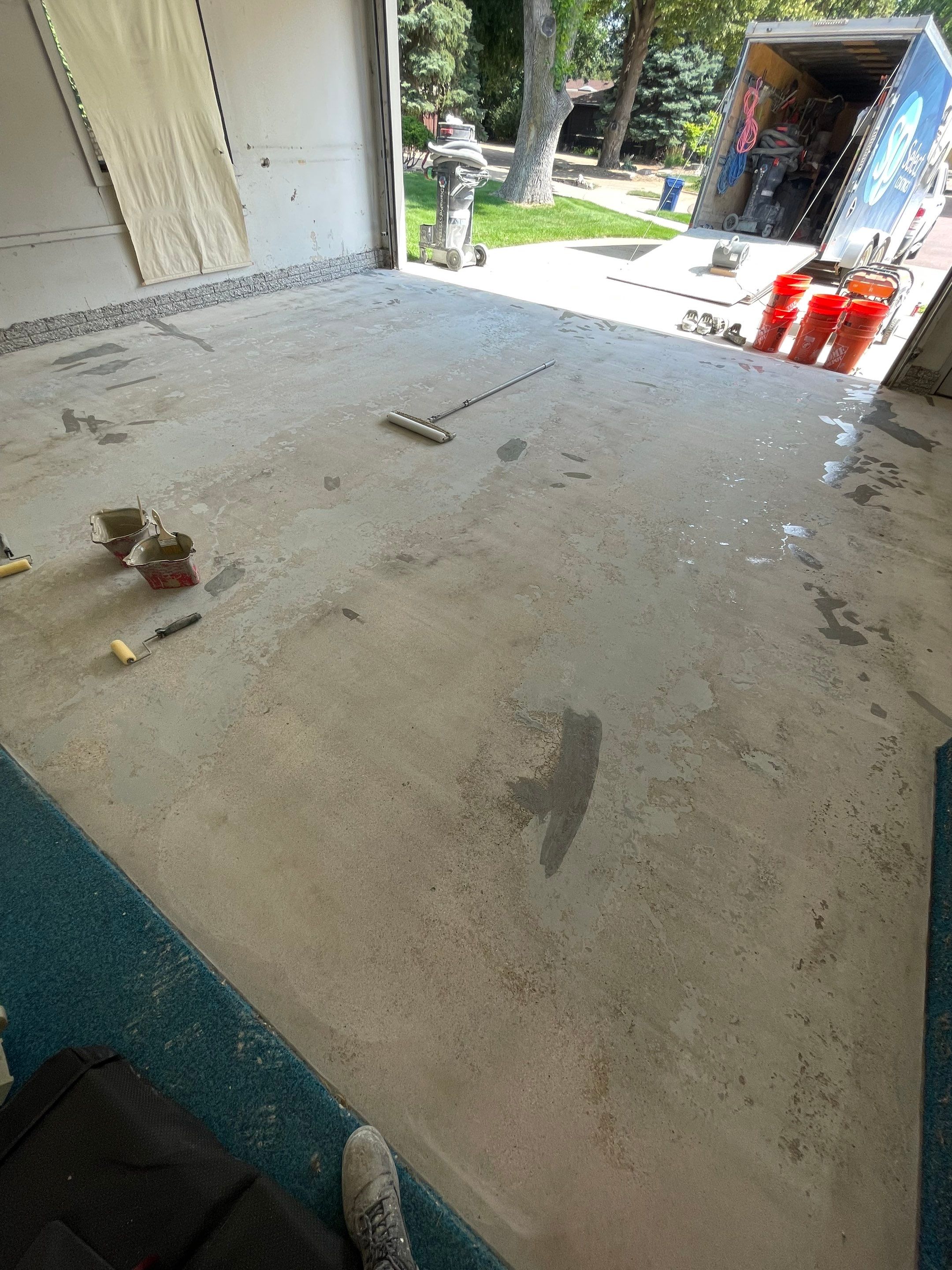 Custom Creekbed Garage Floor Coating in Sioux Falls by Select Painting, Coatings & Garage Cabinets