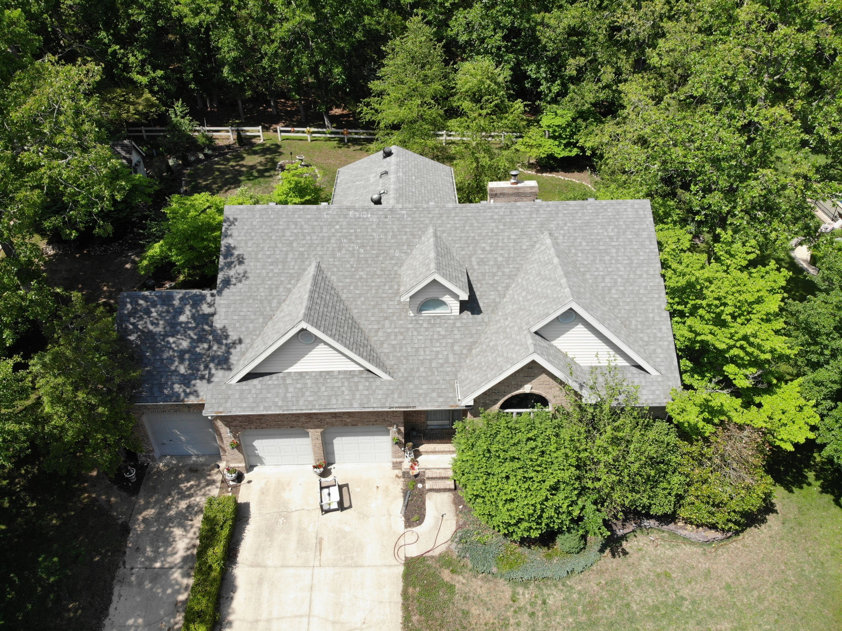 Residential Roof + Gutters & Downspouts & Gutter Guards  by Titan Commercial & Residential Roofing 