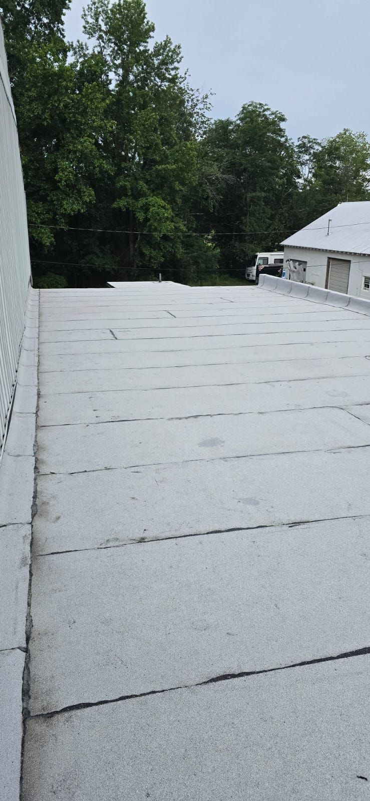 Roof Installation using Silicone APP Elevate Coating by ExteriorPros