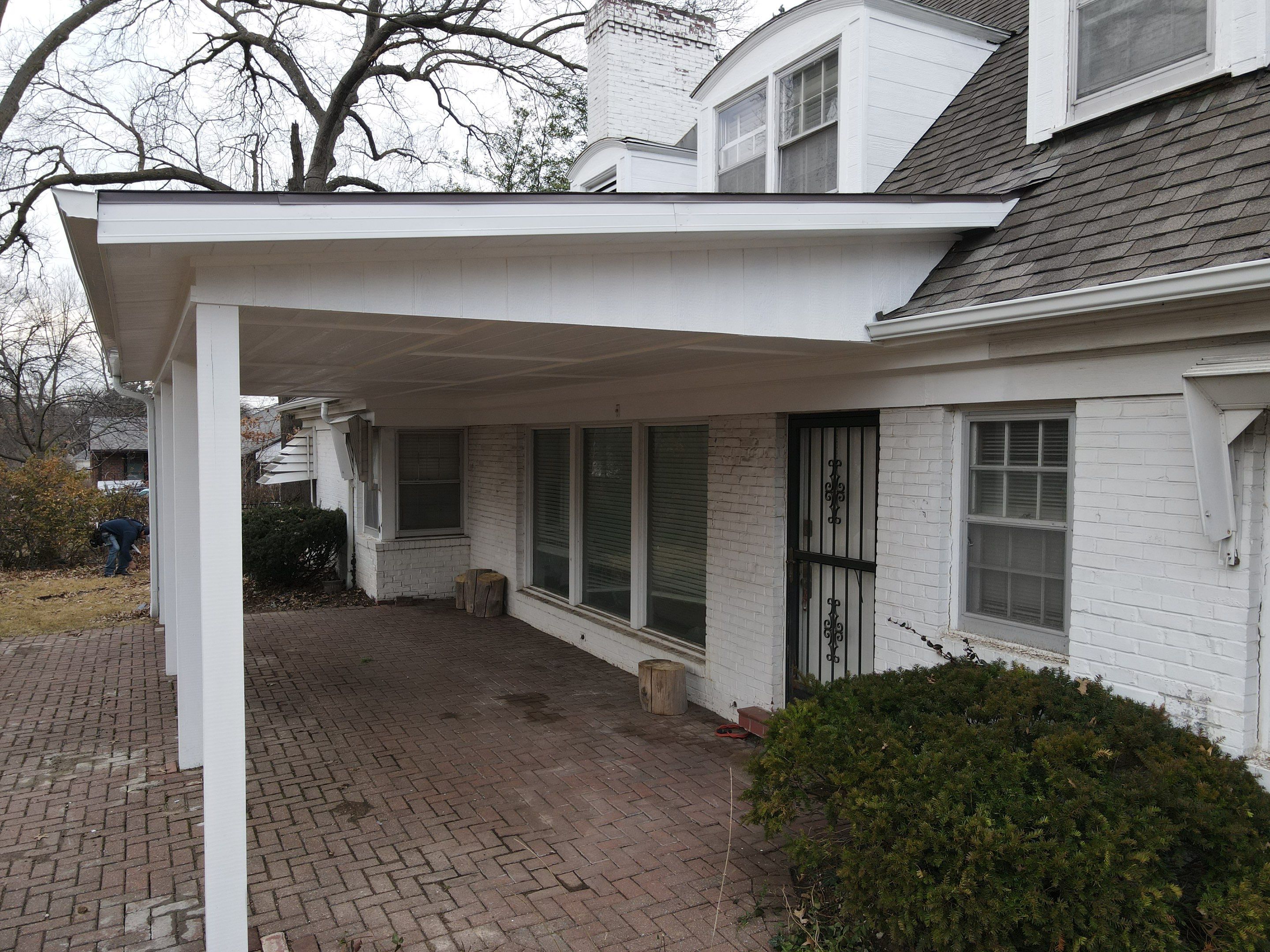 Roof Repair/Awning Rebuild from Tree Damage by Summit Roofing