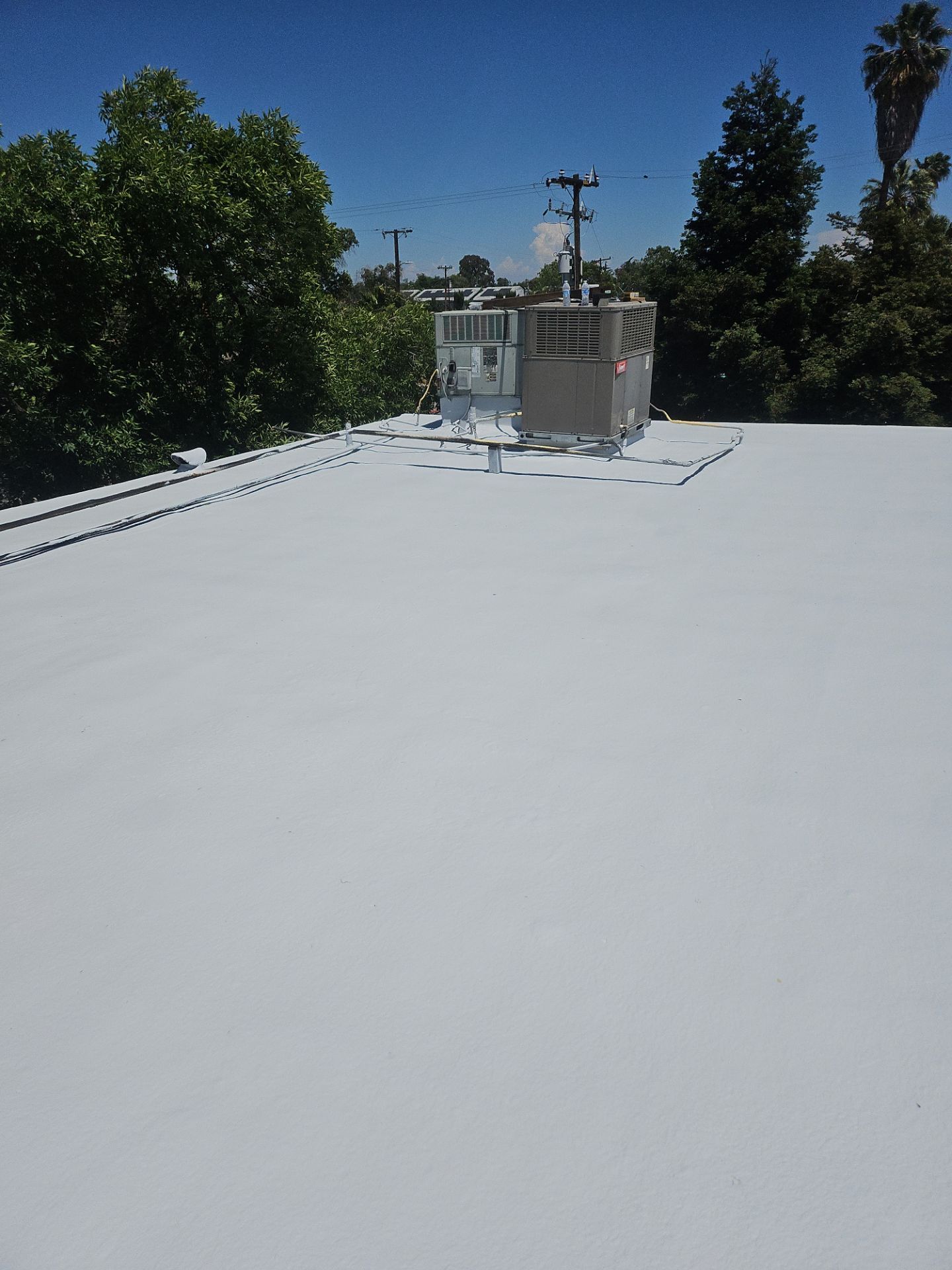 Foam Refurbish using General Coatings acrylic coatings and spray foam by Straight Edge Roofing Inc