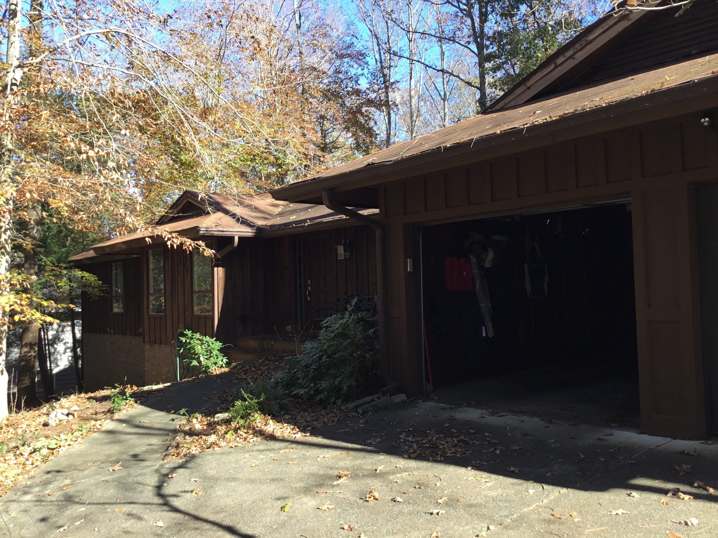 Exterior Wood Siding Painting and Gutter Refurbishment in Roswell by Swift Home Renovations