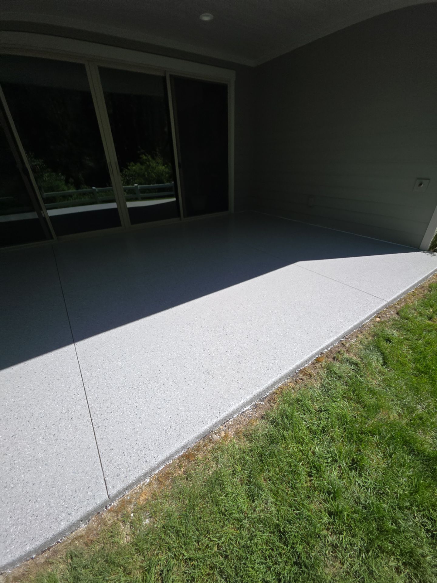 Garage and Porch Concrete Floor Transformation in Rathdrum by Croc Coatings, LLC