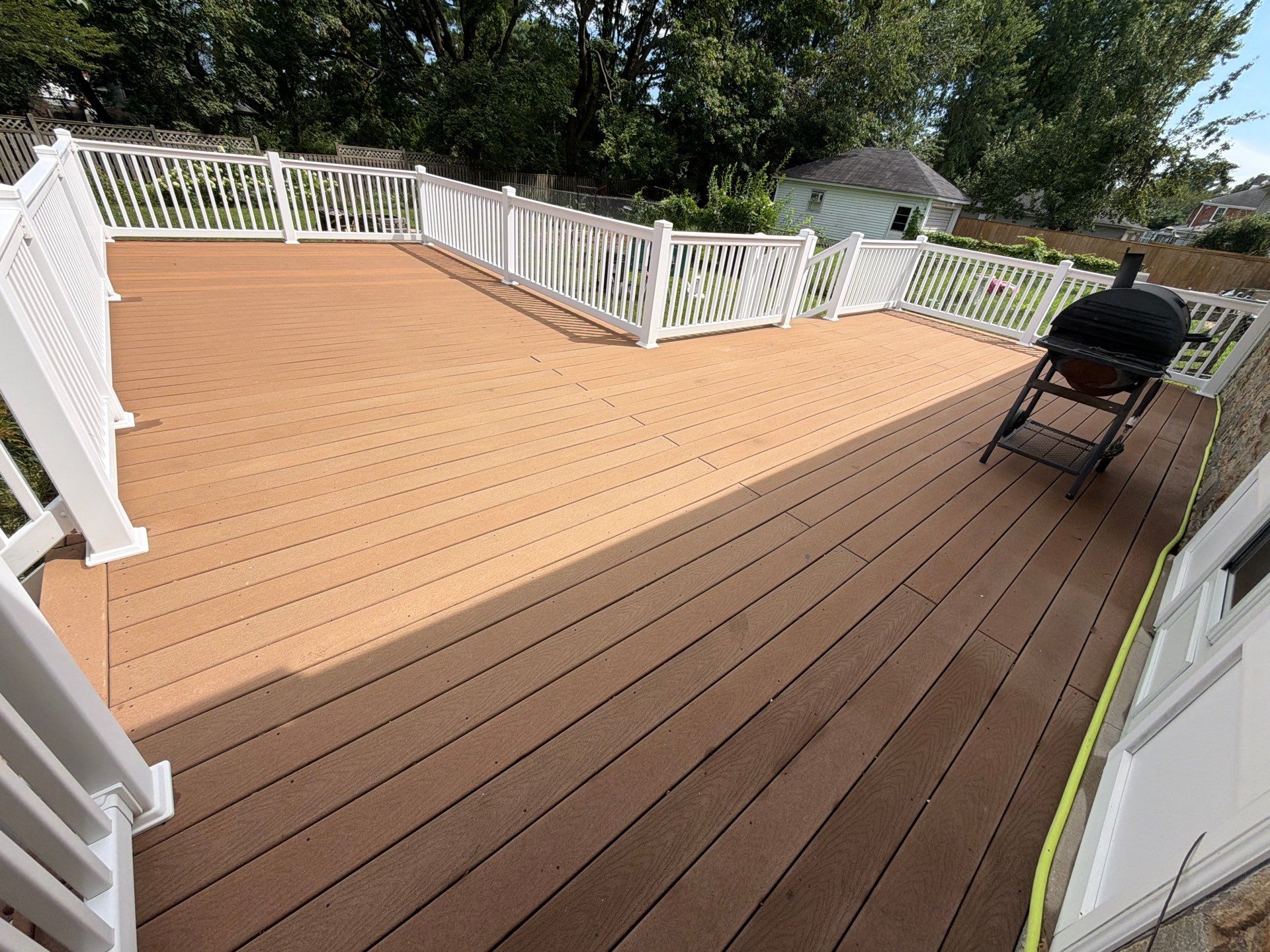Composite Deck and Flagstone Walkway Washing by Baltimore Pressure Washers Inc.