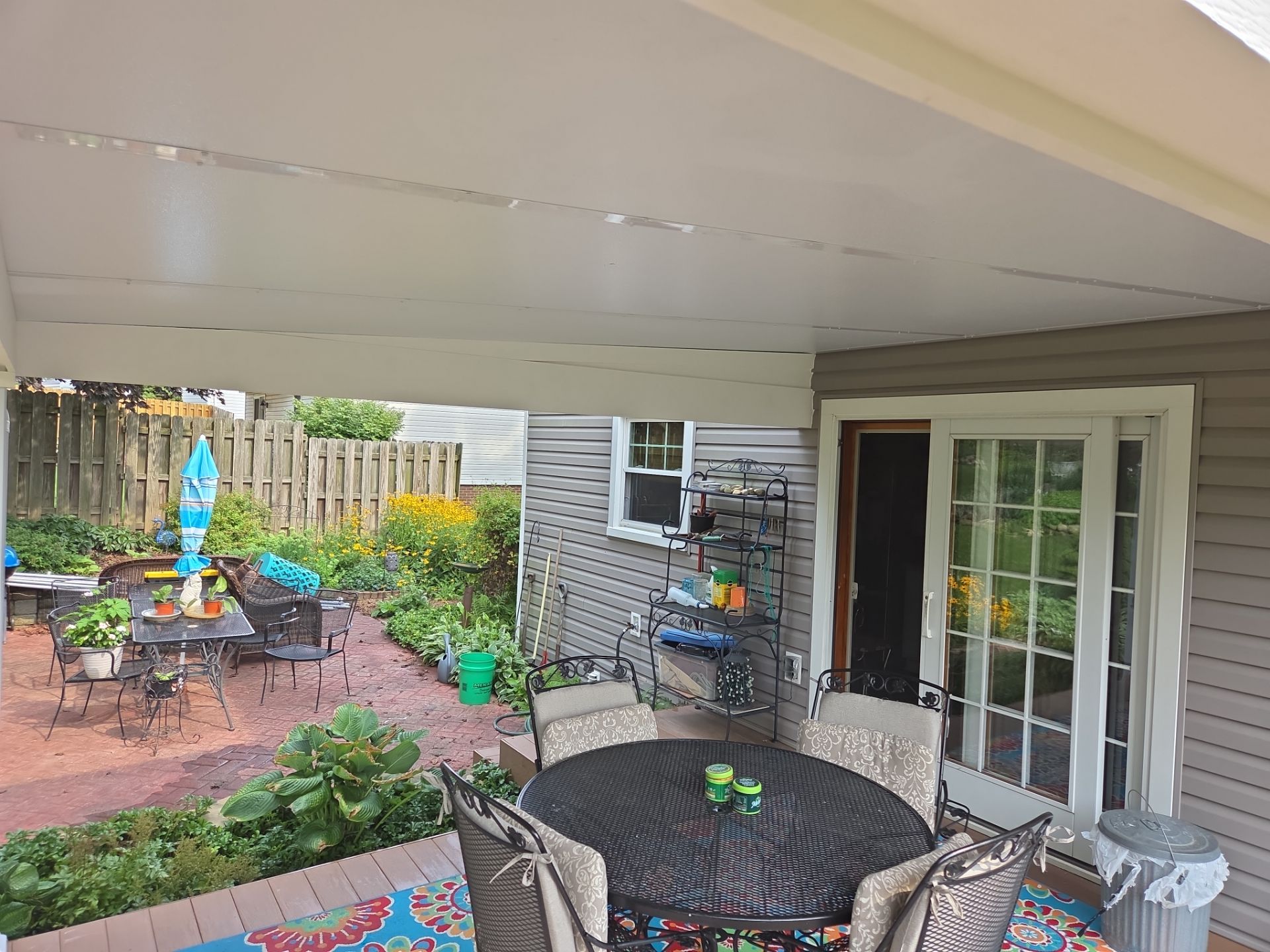 Composite Deck Build with Integrated Patio Cover in Washington by Cousins Roofing Siding & Decks