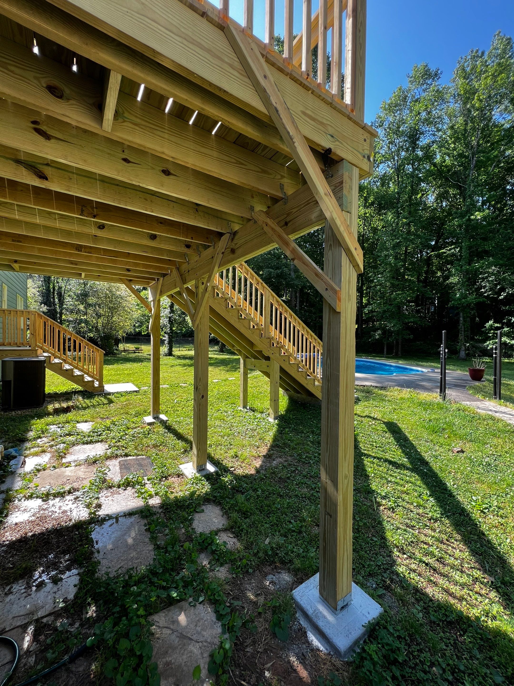 Elevated Pressure-Treated Wood Deck Replacement in Marietta by Swift Home Renovations