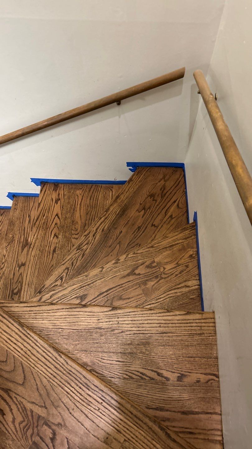 Parquet floor and stair treads by Footprints Floors of Nashville