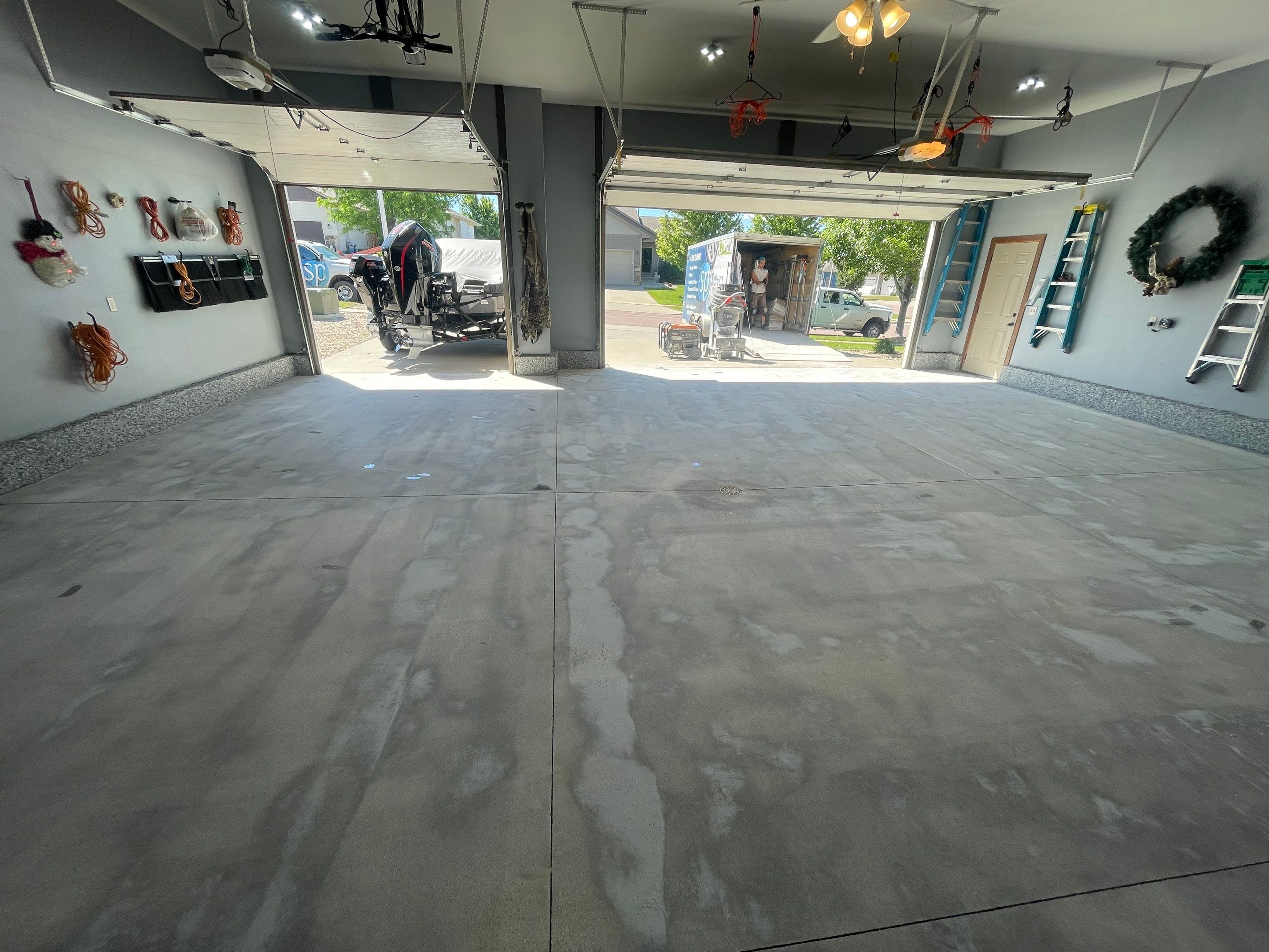 Residential Garage Floor Coating in Sioux Falls by Select Painting, Coatings & Garage Cabinets