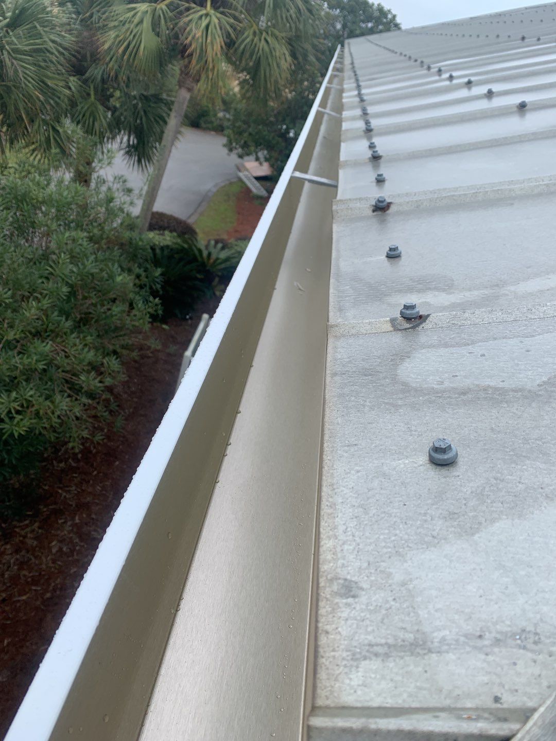 Seamless Gutter Installation Using White K-Style Gutters by Gutter Professors