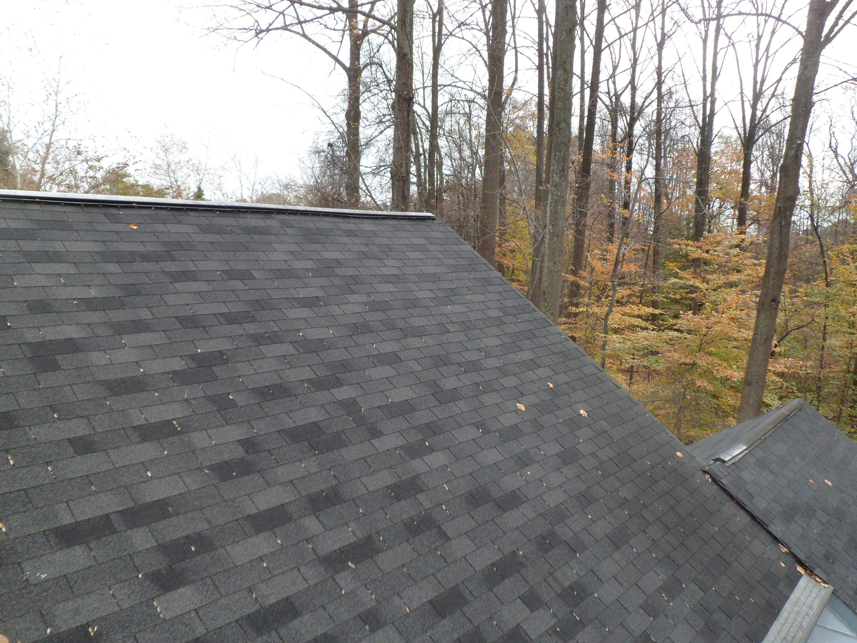 Residential Roofing Installation using Charcoal Black by Alpha Design Services