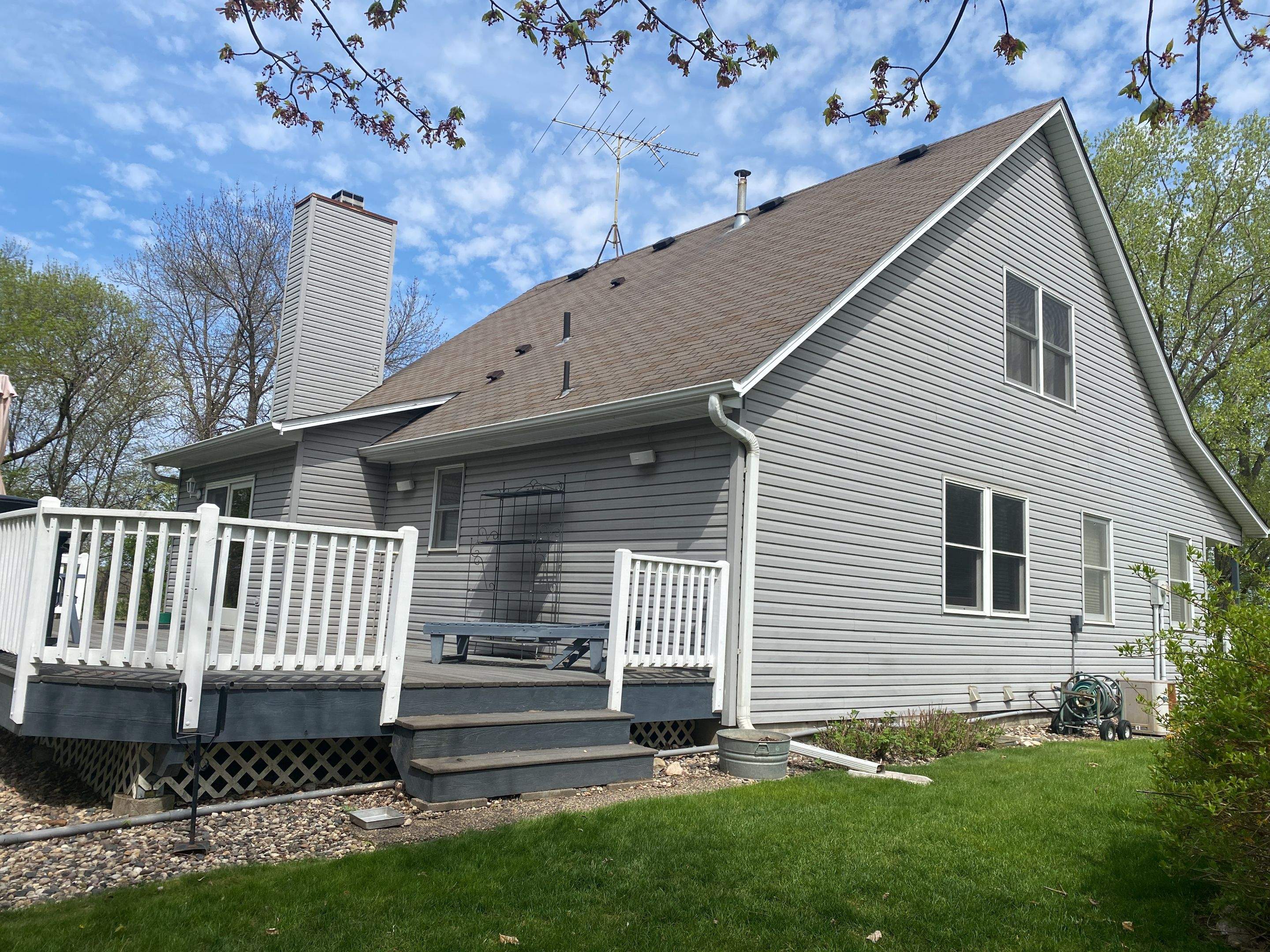 Residential Roofing Installation using Certainteed Landmark Moire Black by MODERN EXTERIOR SYSTEMS