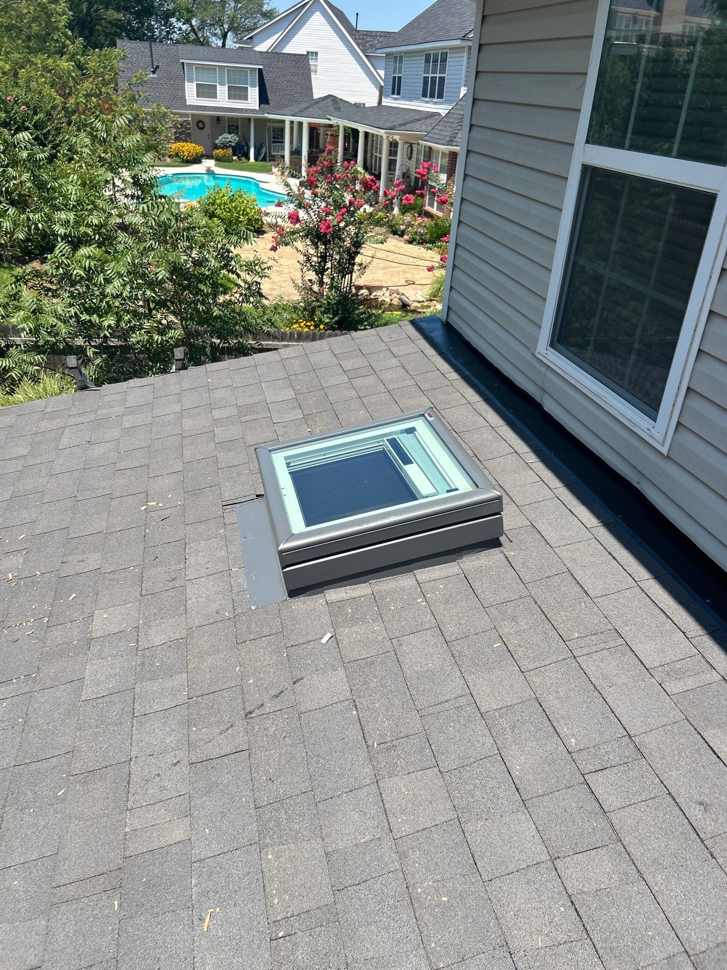 Roof Replacement and Skylight Installation in Norman, OK by McCann's Roofing and Construction