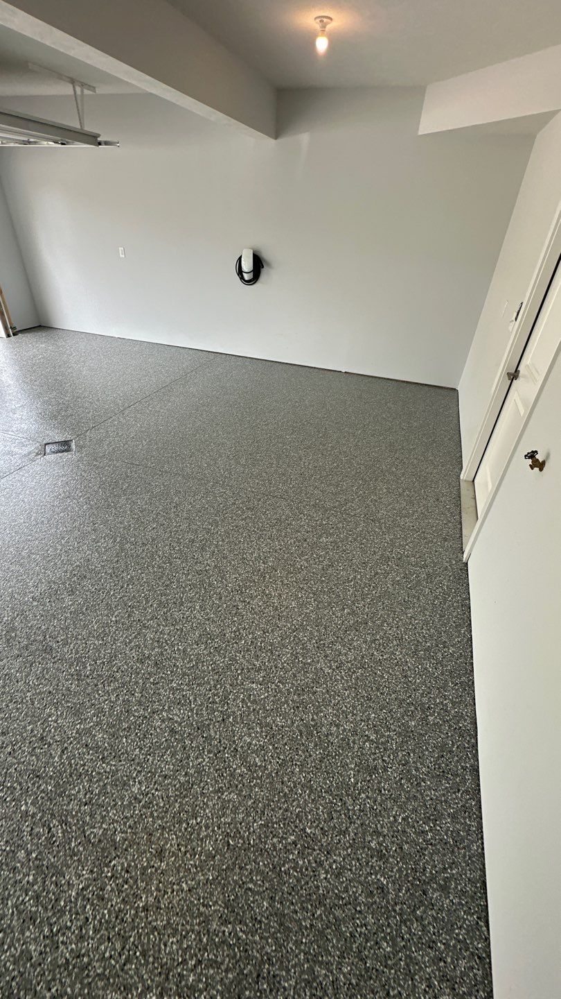 Porch + Garage Project in Evans City by Floors in a Day, Inc