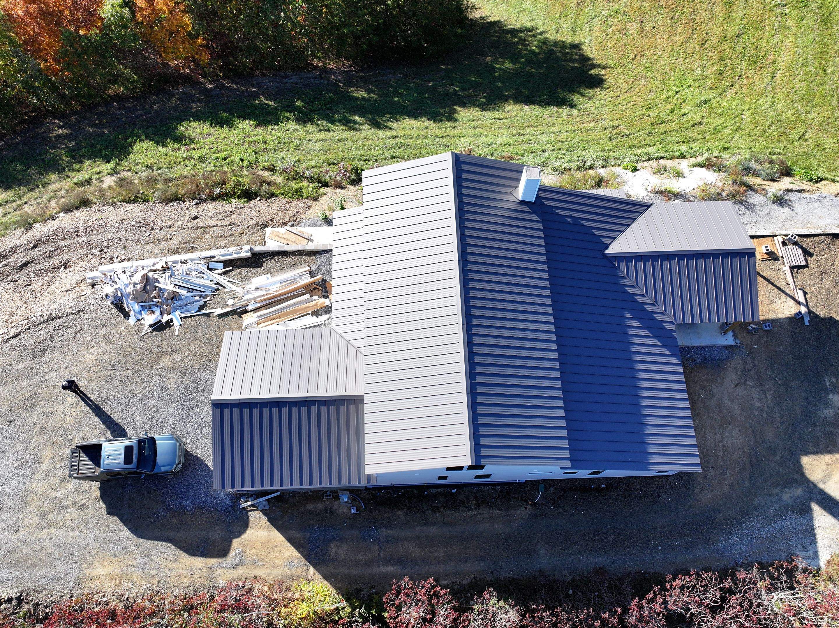Textured Charcoal Gray Standing Seam by Omnia Roofing
