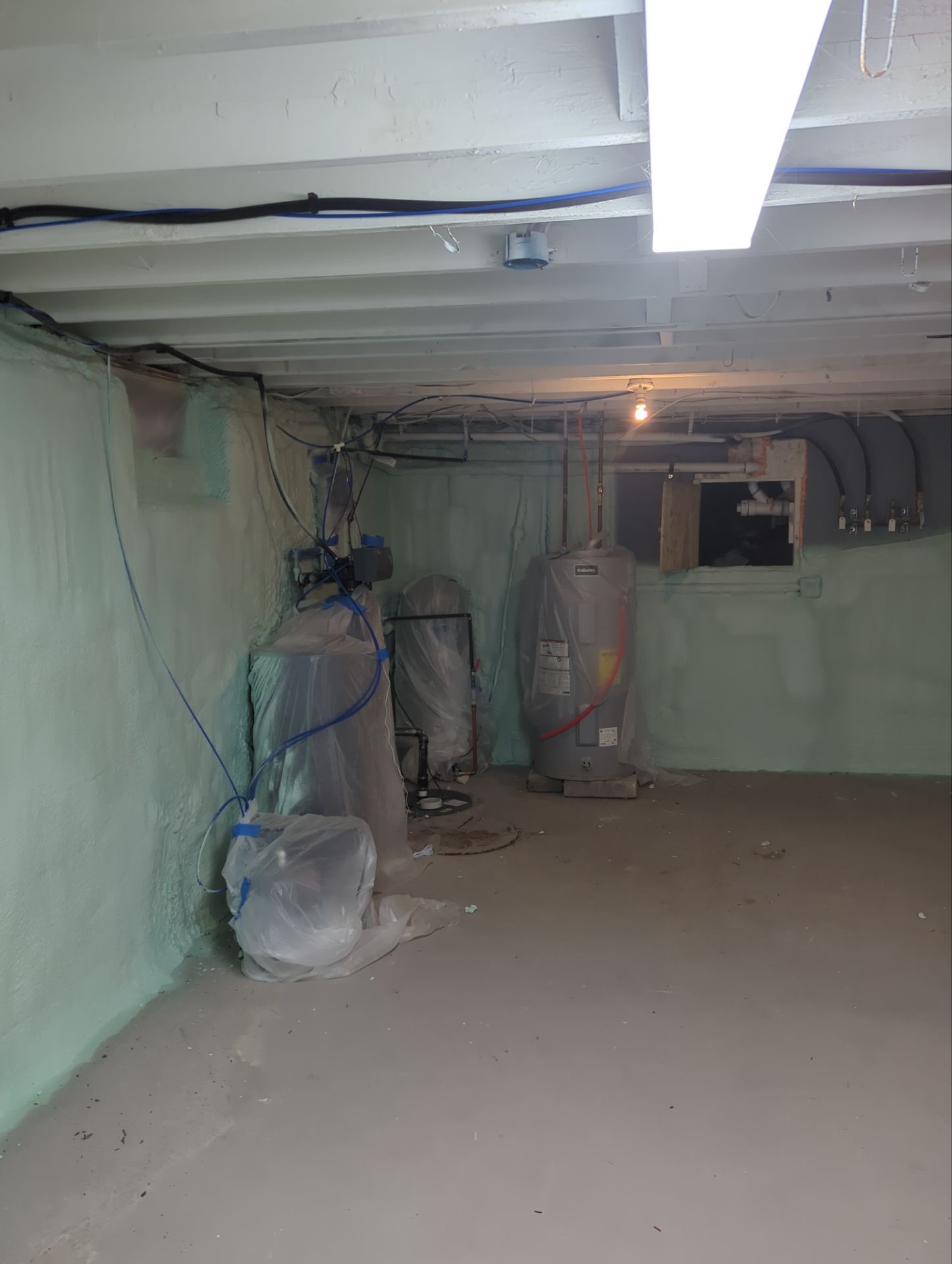 Basement Exterior Walls using Closed Cell Spray Foam by NYS Foam & Energy