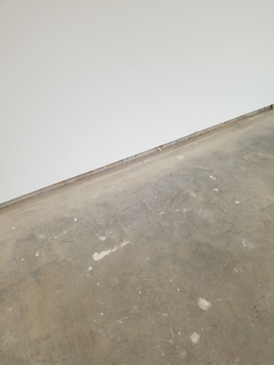 Garage Floor in Sandstone by Spectrum Painting, LLC