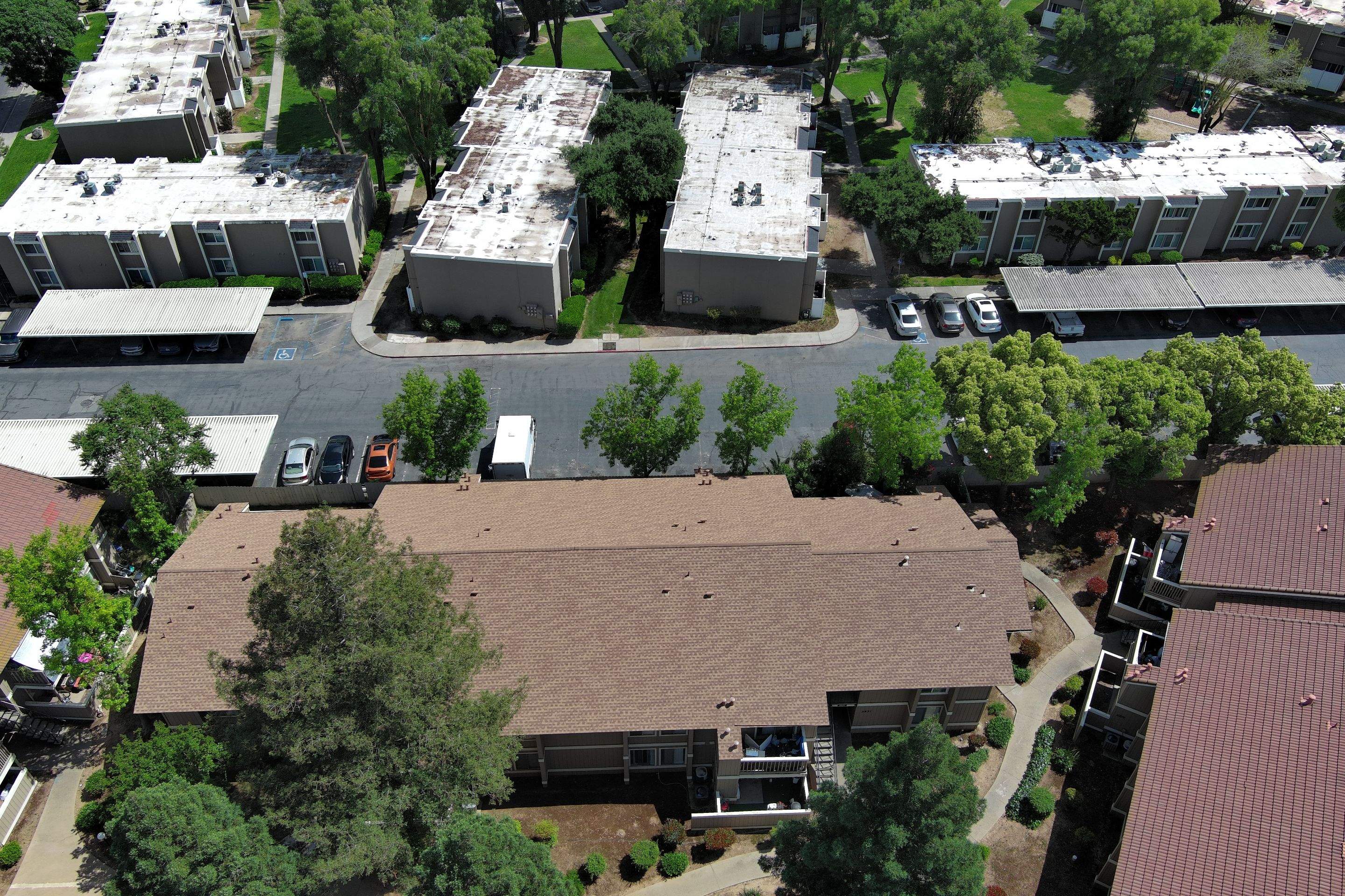 Removed tile from roof and replaced with shingles by Straight Edge Roofing Inc