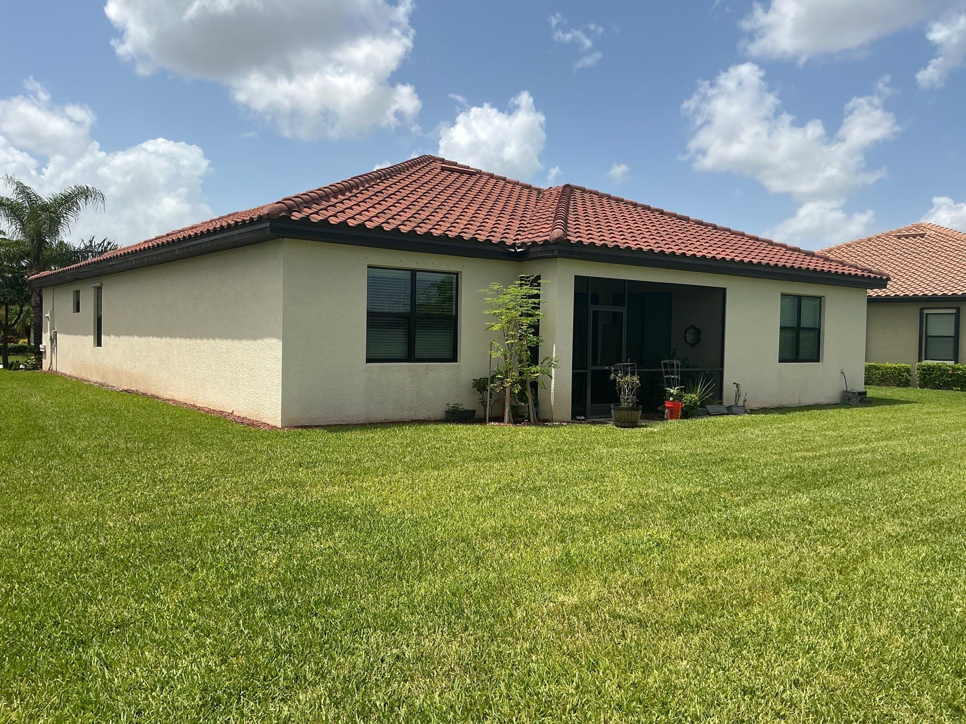 Black 6-Inch Seamless Gutters in Fort Myers FL by Gutter Professor by Gutter Professors
